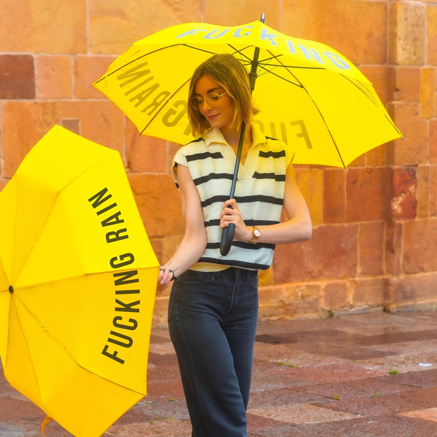 Fisura – Large umbrella with message p*ta lluvia, stylish black youth umbrella with automatic open button, windproof and durable for daily use, lightweight design with 41.7 inches diameter