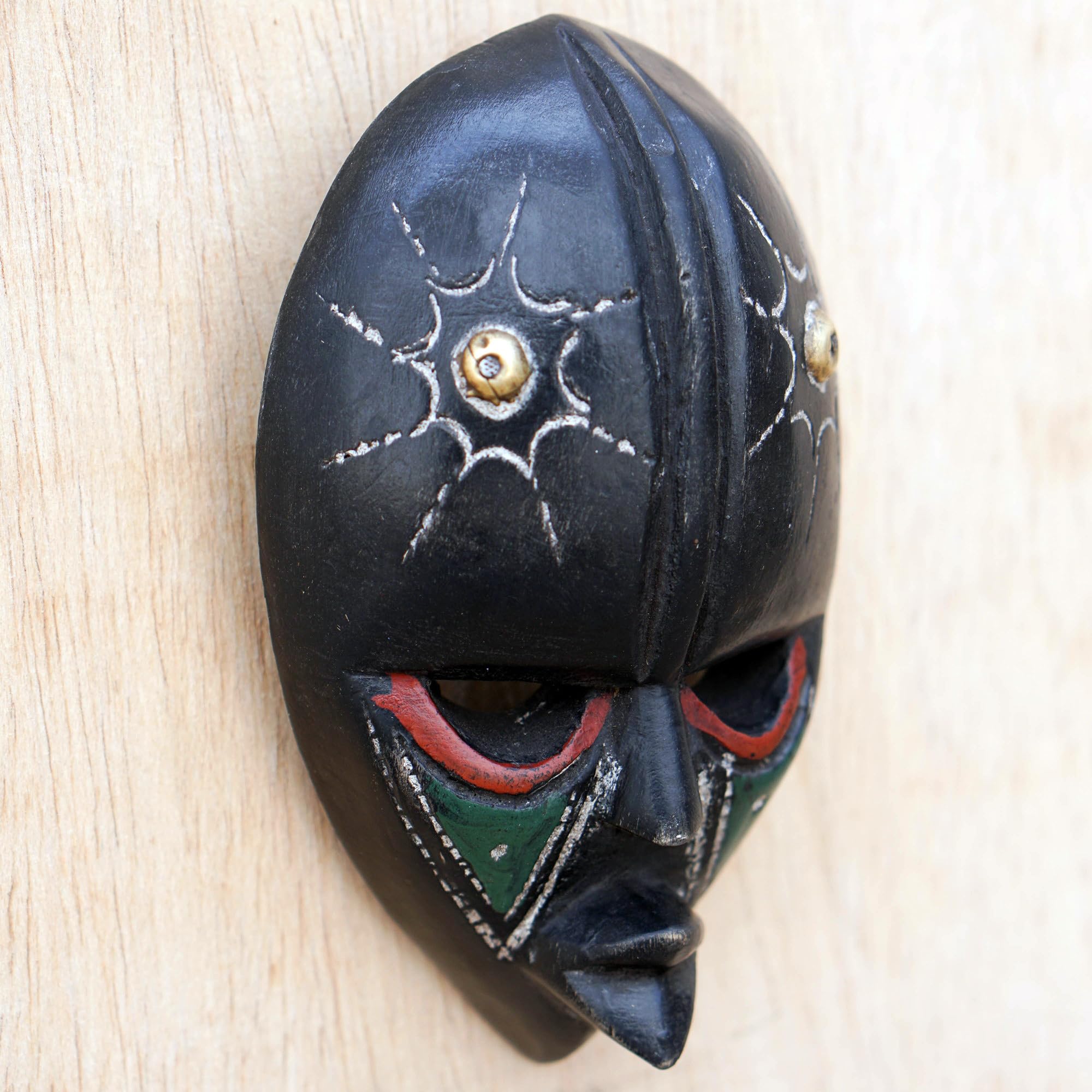 NOVICA Artisan Handcarved African Wood Mask Sese Wall from Ghana Black Multicolor Woodbrass Masks Ghanaian [5.75in H x 3in W x 1.4in D] ' Stellar Thoughts'