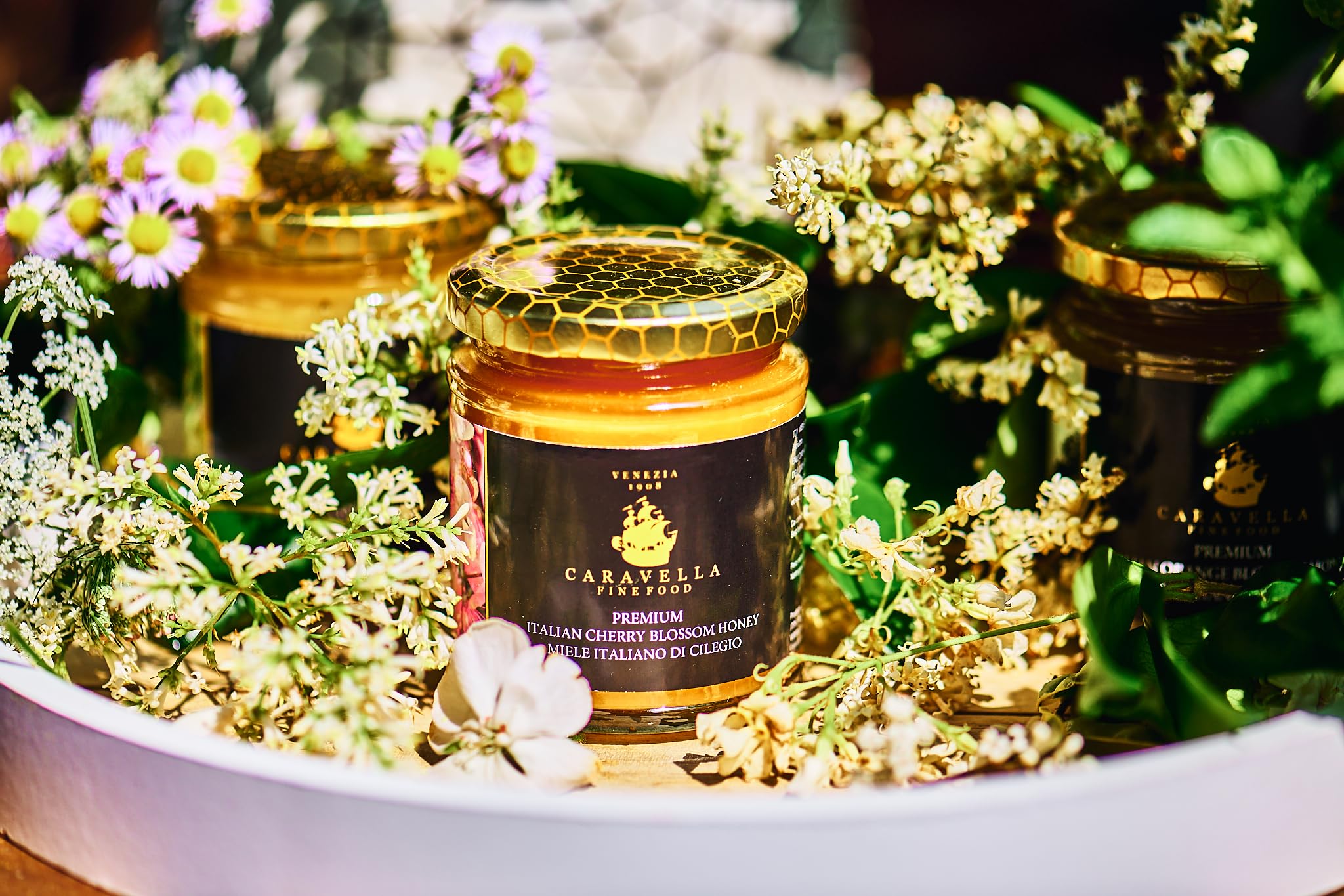 4x Miel de Fleurs de Cerisier 250g Caravella Fine Food| Italien Fleurs de Printemps Pur Cru Riche en Antioxydants| Ambré Clair aux Notes Florales Fruitées|Idéal pour Thé Fromage Petit-Déjeuner Dessert