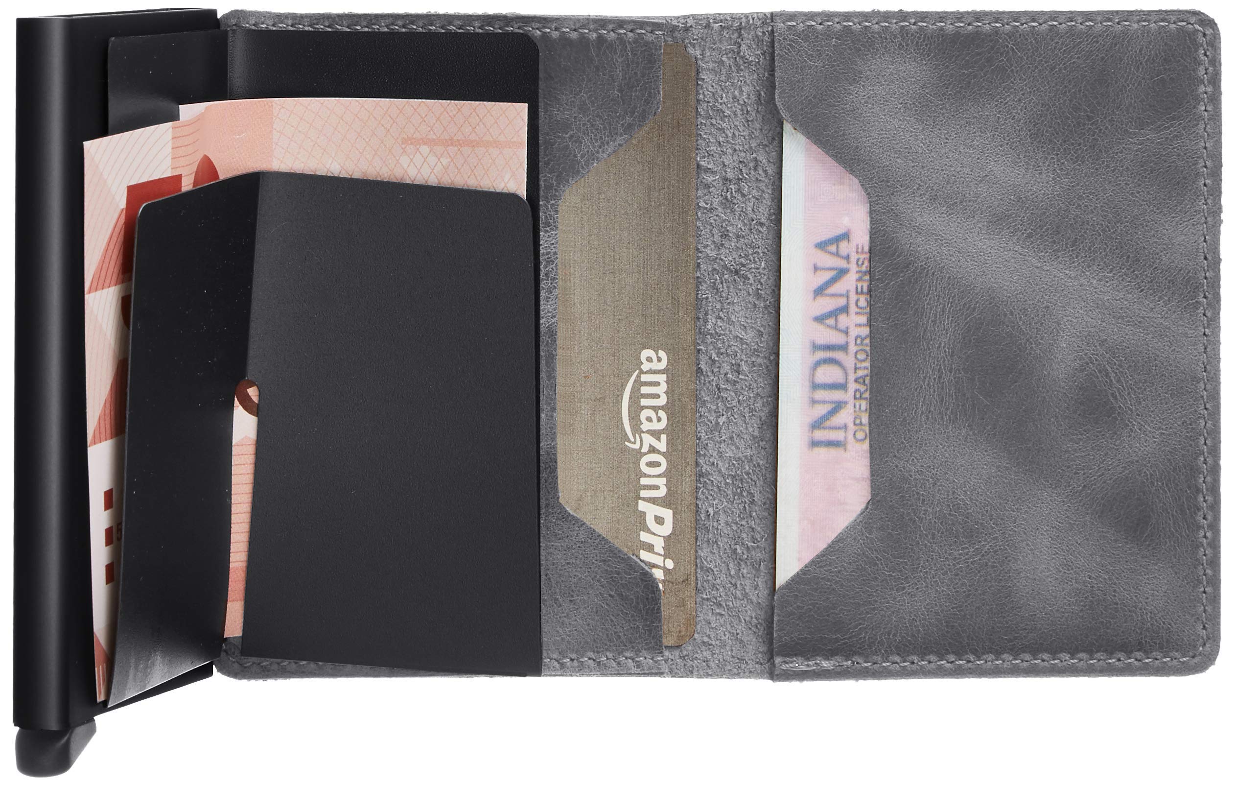 Secrid Lo Slimwallet Vintage in pelle è una versione moderna del classico portafoglio. Con il suo profilo sottile si adatta perfettamente a ogni tasca. Capacità 4 carte in rilevo/6 carte lisce Bancon