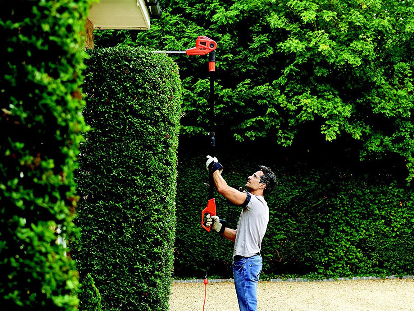 BLACK+DECKER PH5551 Cortasetos de Pértiga de 550W 51cm de Longitud de Espada con Mango Telescópico y Cabezal Pivotante de 5 Posiciones