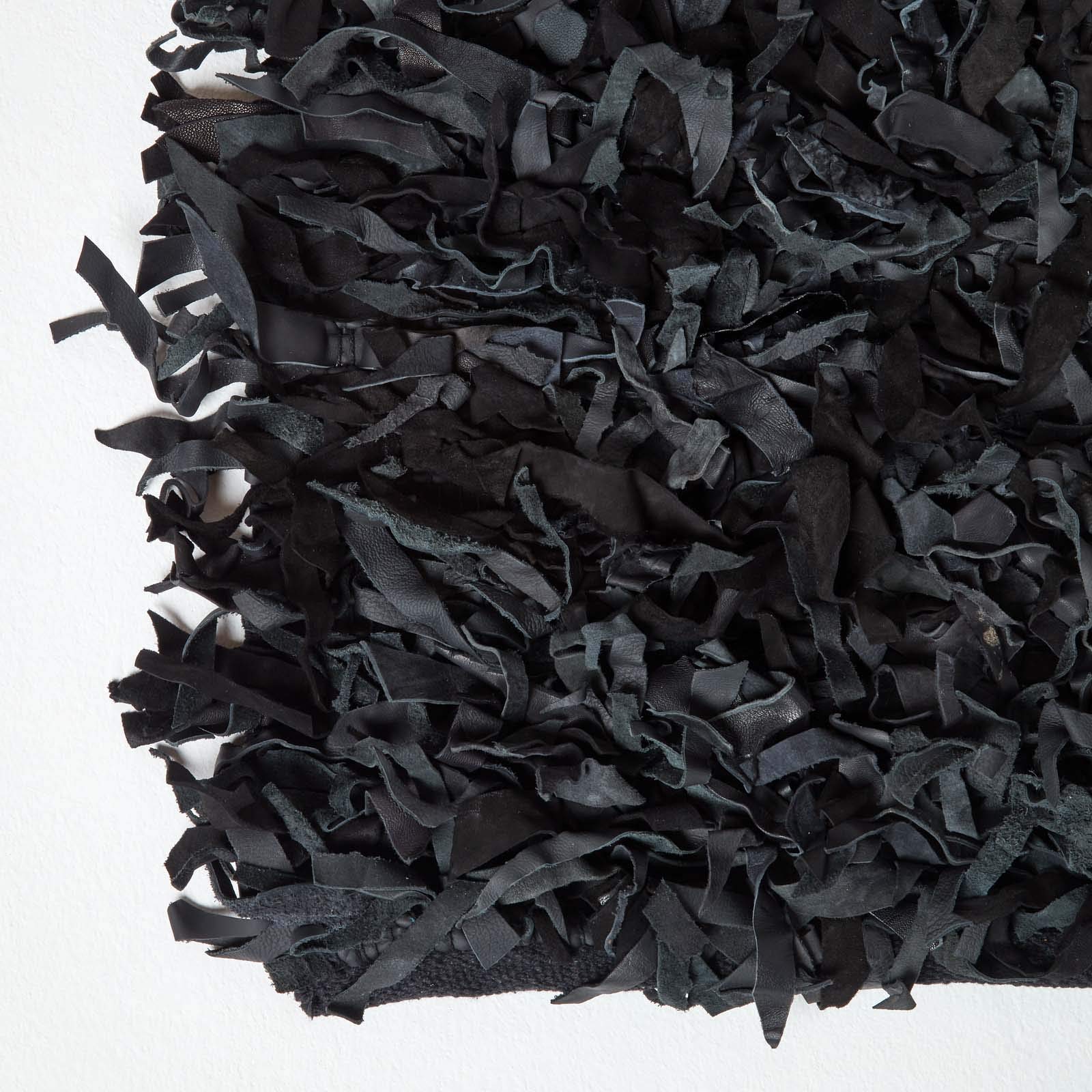 Homescapes Lederteppich Dallas 150 x 240 cm, Fransenteppich aus 100% Echtleder, moderner Shaggy-/Hochflor-Teppich, schwarz