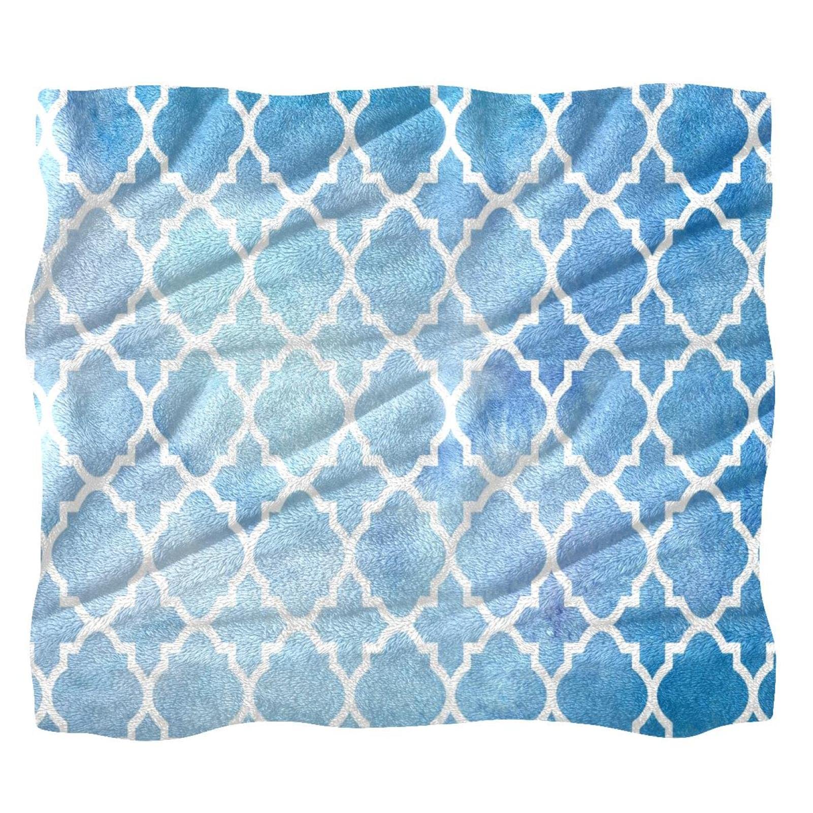 Couverture polaire douce pour cocooning sur canapé avec motif bleu