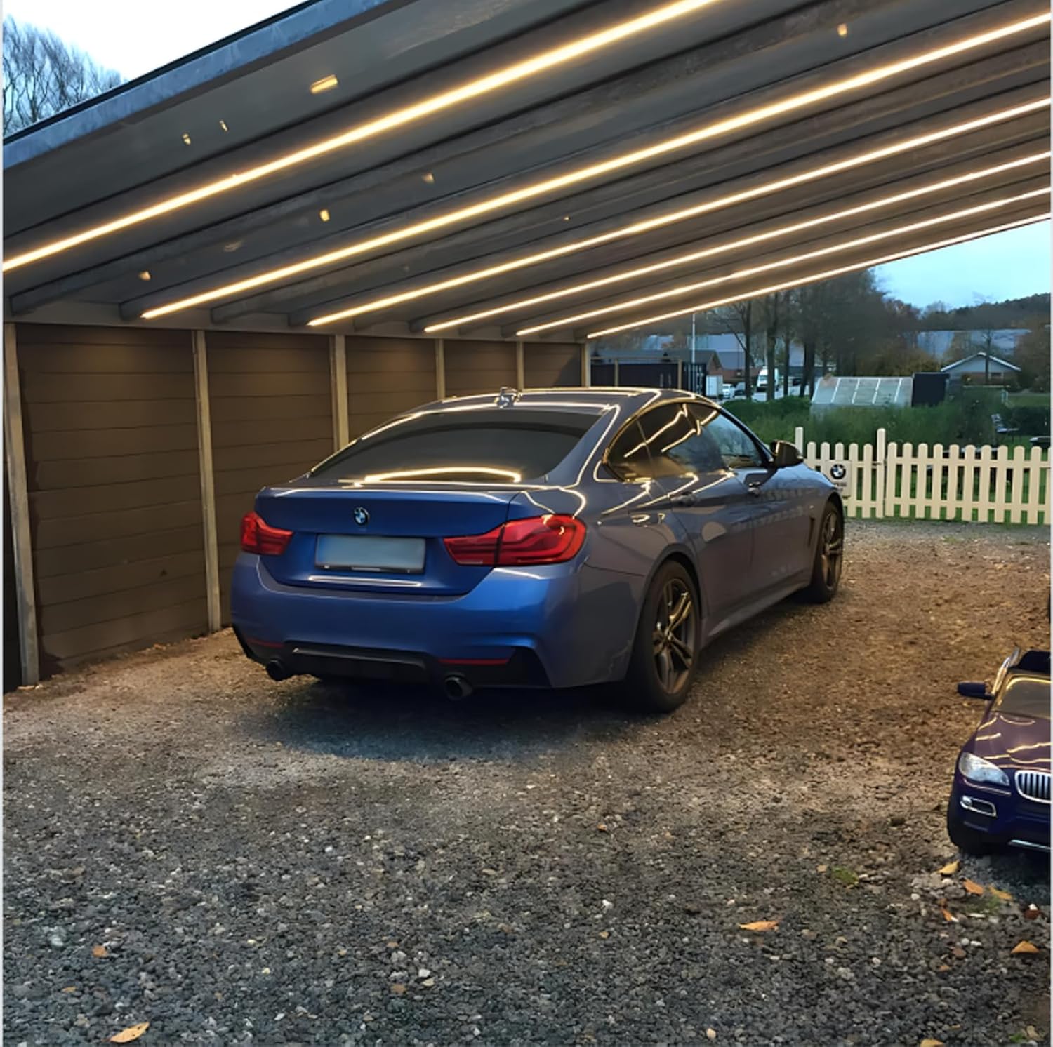 Carport illuminated with warm white FORT LED Neon Rope Lights, offering practical and decorative lighting.