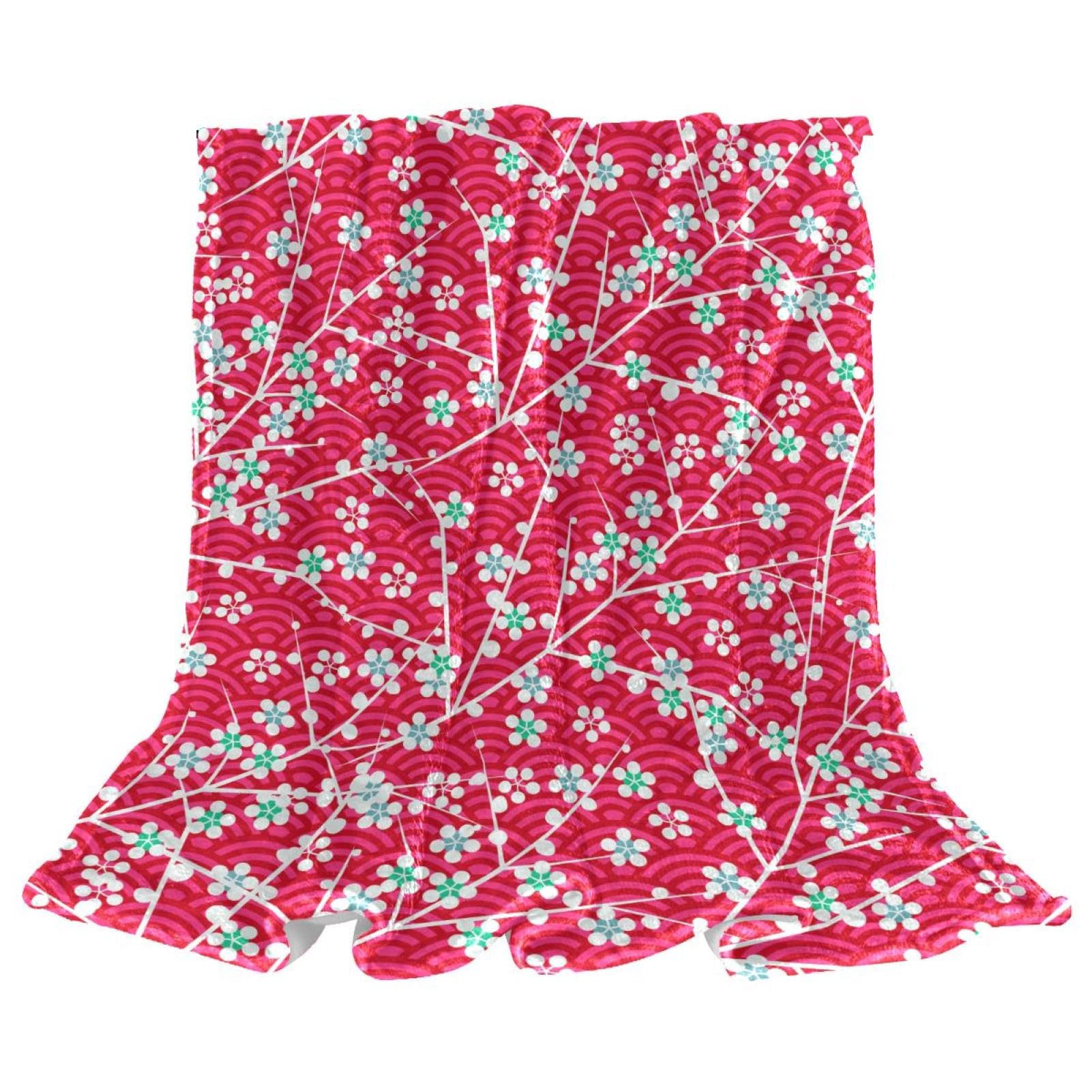 Couverture polaire fleur 150x200cm aux finitions soignées pour lit et canapé chic