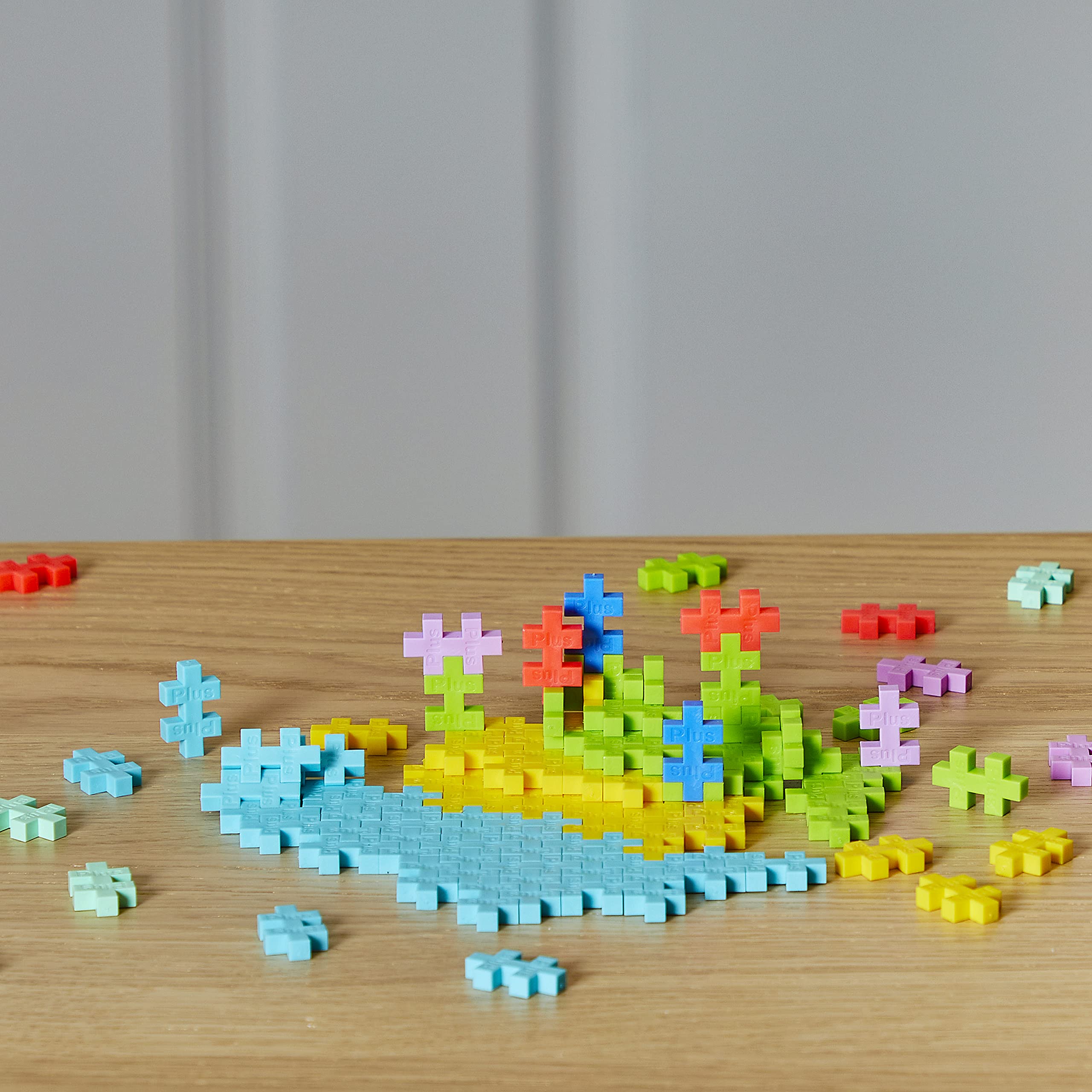 PLUS PLUS 240 Piece Interlocking Building Blocks for Kids, Open Ended Connecting Toys, STEM Bin Mini Manipulatives - Tropical Mix Play Tube & Baseplate