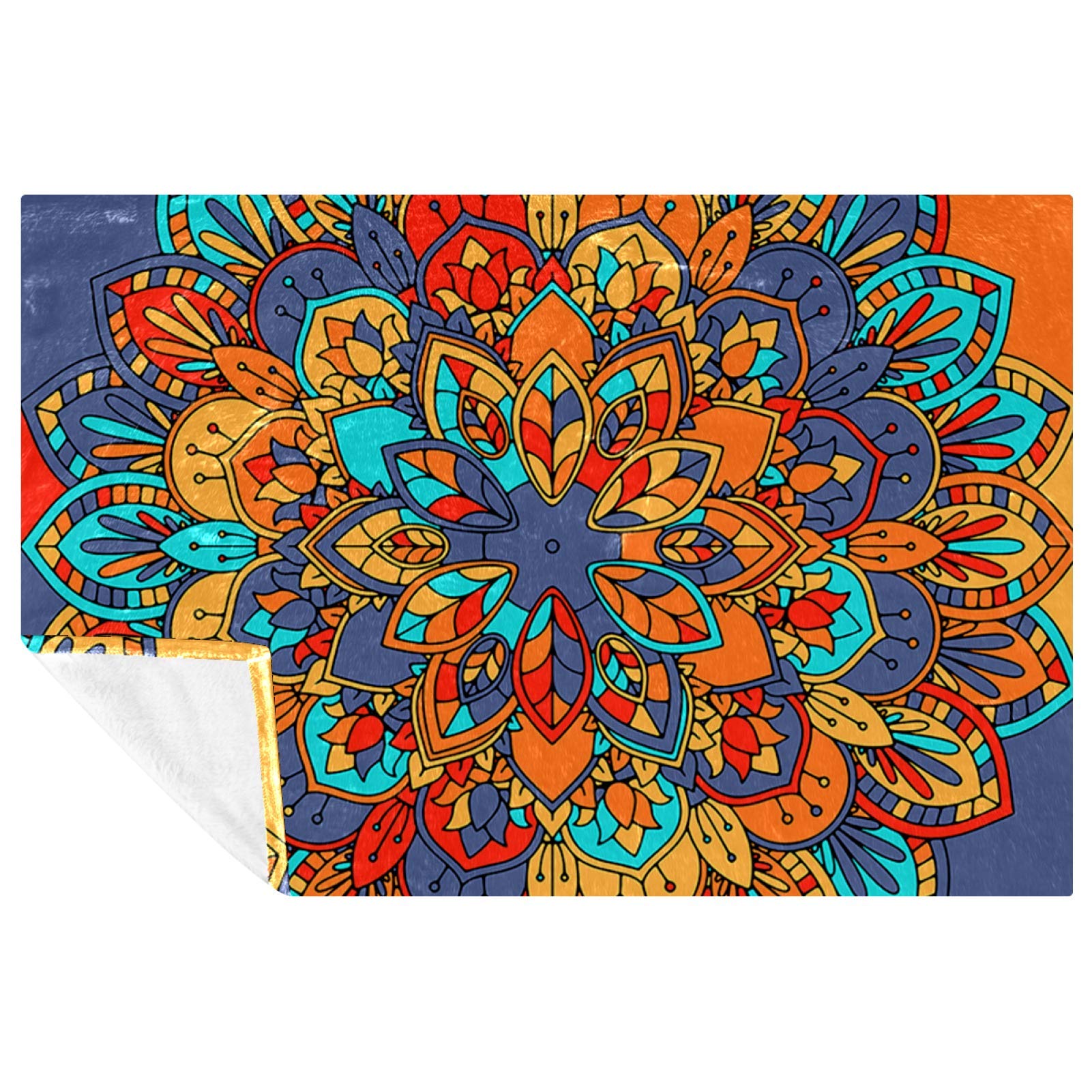 Couverture douce mandala bleu orange pour des soirées cocooning