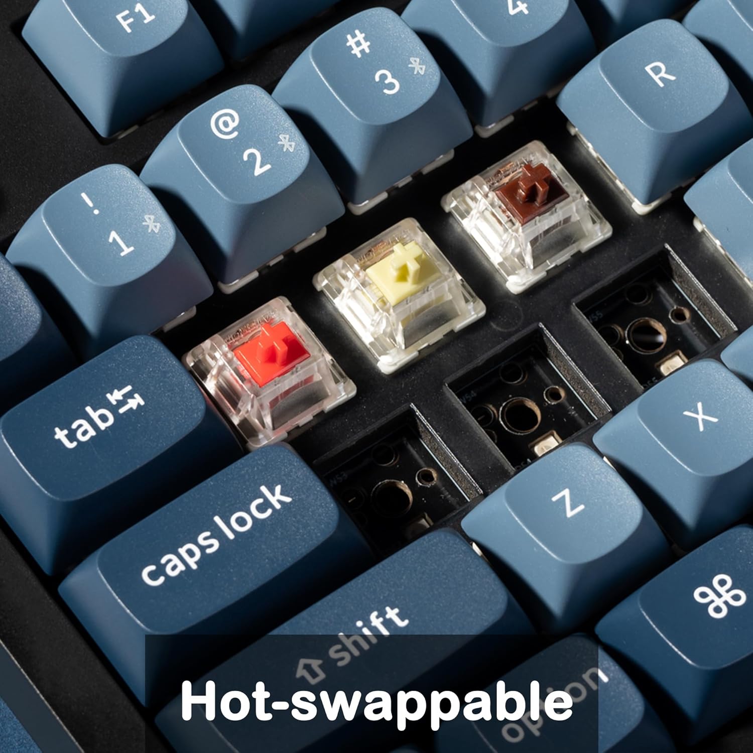 Close-up of Keychron V5 Max keyboard showing hot-swappable switches with keycaps removed.