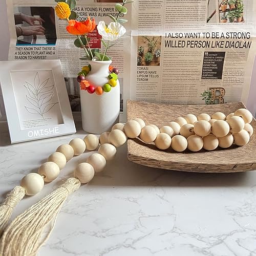 Vista 7 de OMISHE Guirnalda de cuentas de madera grande de 57 pulgadas de largo con cuentas de madera y borlas de 1.2 pulgadas de diámetro, guirnalda