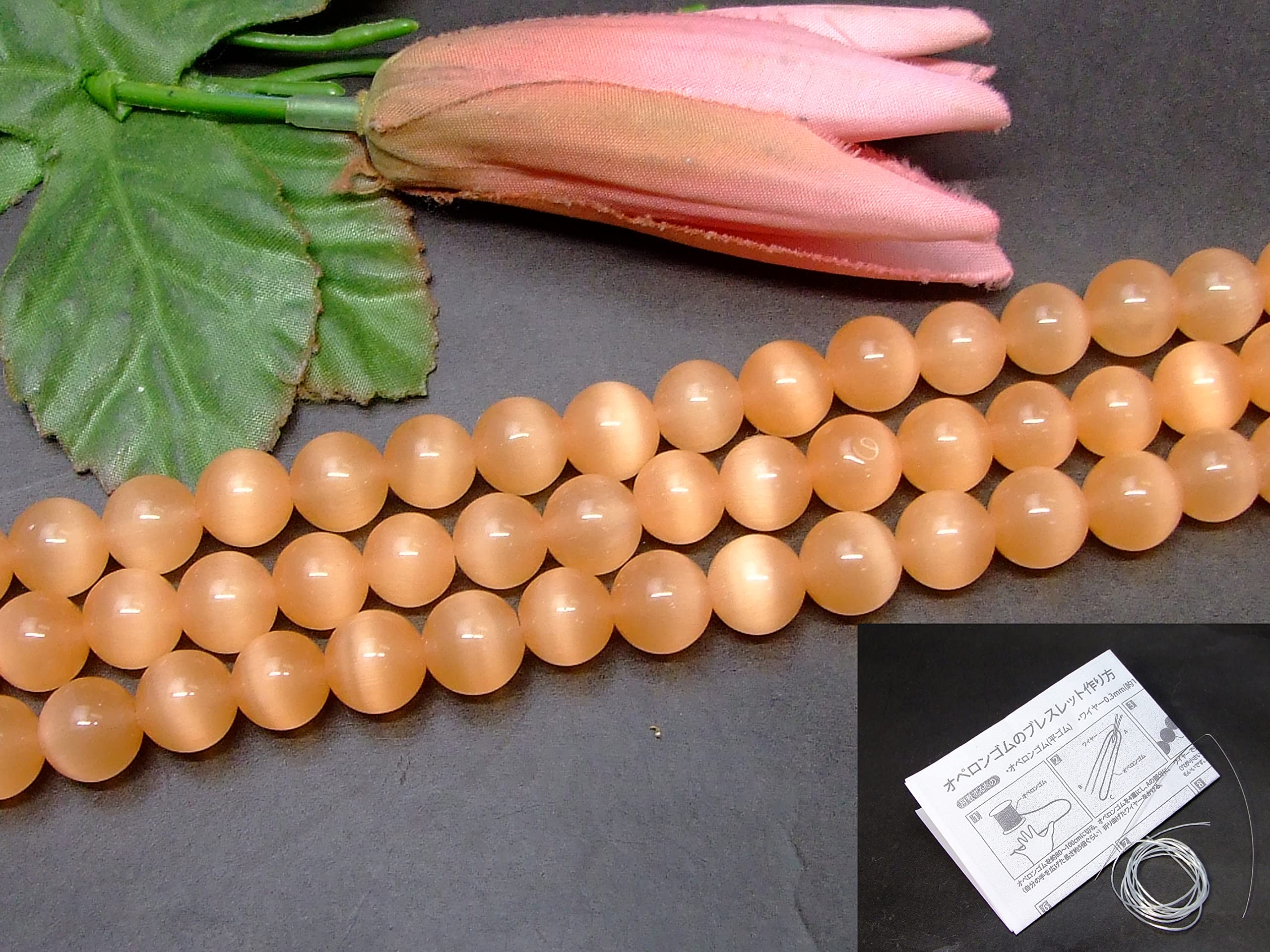 K◇キャッツアイ　丸玉　天然石　ハニー　猫目石1.500g　台座付き 送料無料＞入手困難！ハニーカラーキャッツアイ（猫目石）