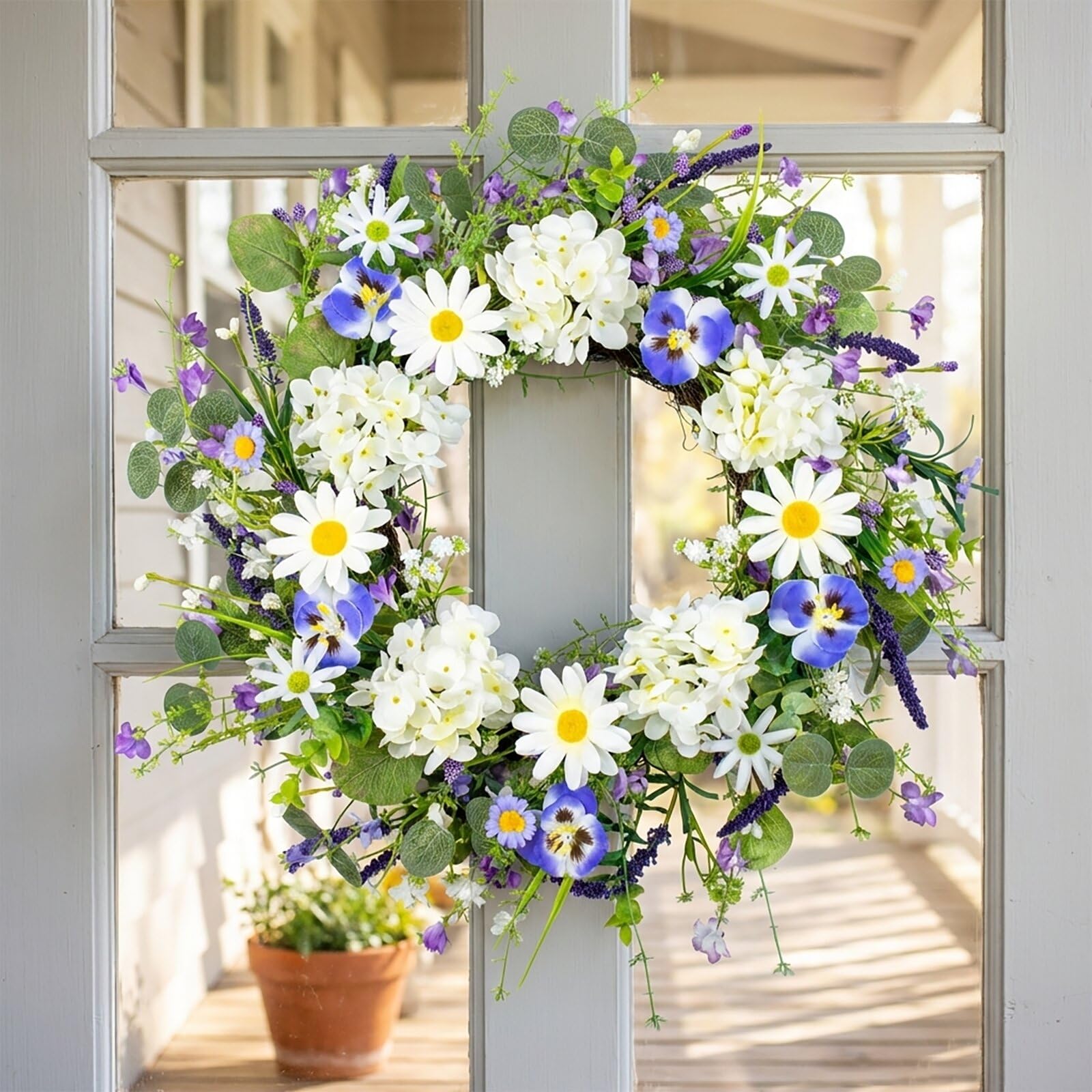 Couronne de porte à ressort avec fleur blanche 55,9 cm