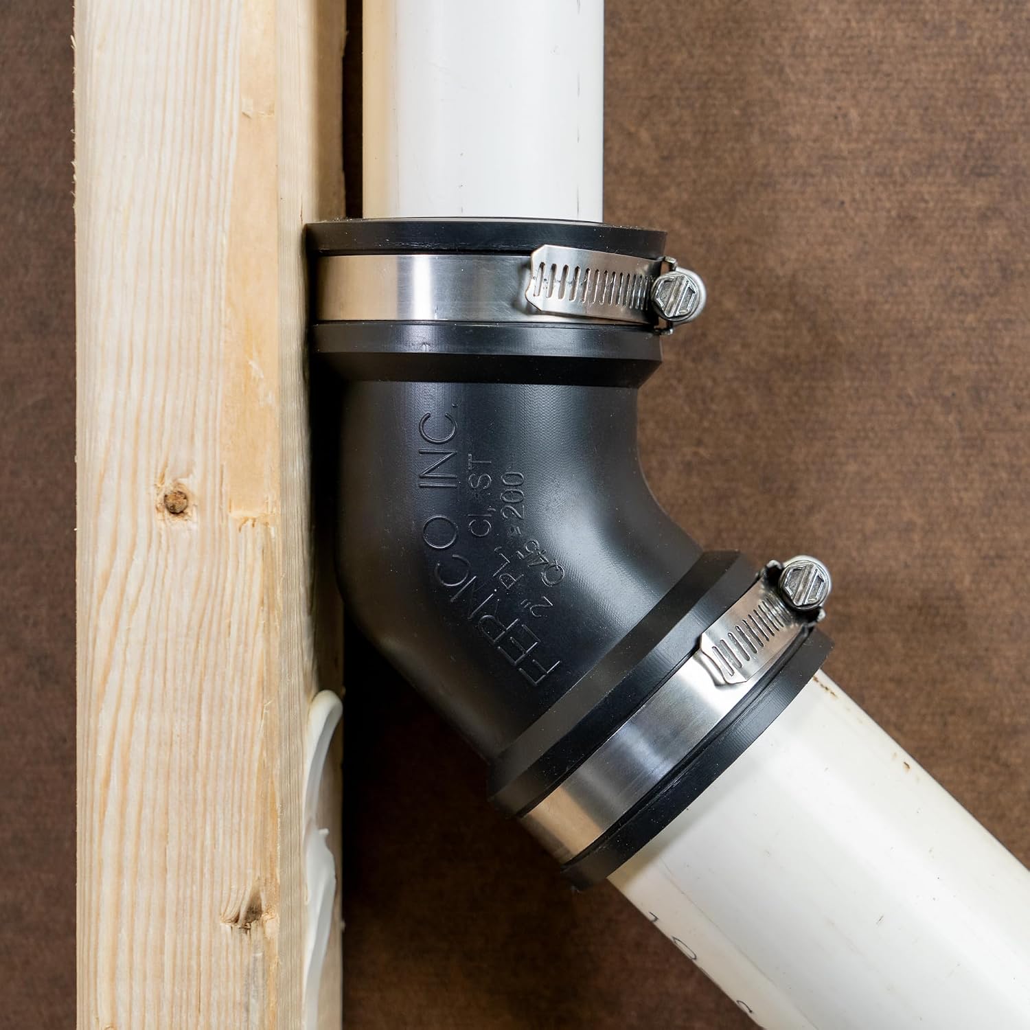 Fernco Qwik Ell 1.5 in. Hub 45-Degree Flexible PVC Elbow Fitting Includes Optional 1.25 in. Reducer Bushing