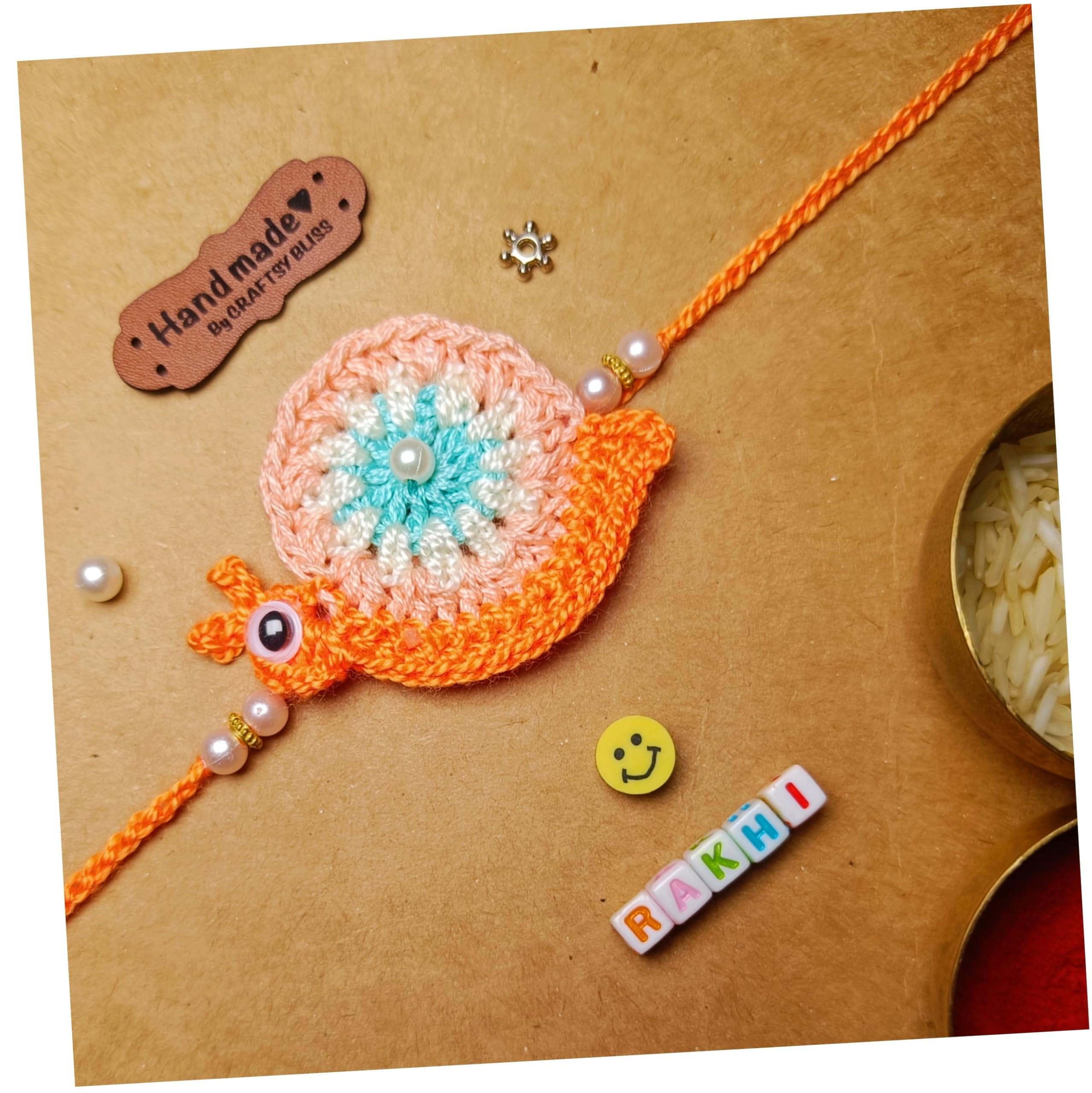 Handmade by Craftsy Bliss Designer Snail Crochet Rakhi Knit With Soft Cotton Thread | Rakhi For Kids | Crochet Rakhi (B0DCCFPTFG) Amazon Price History, Amazon Price Tracker