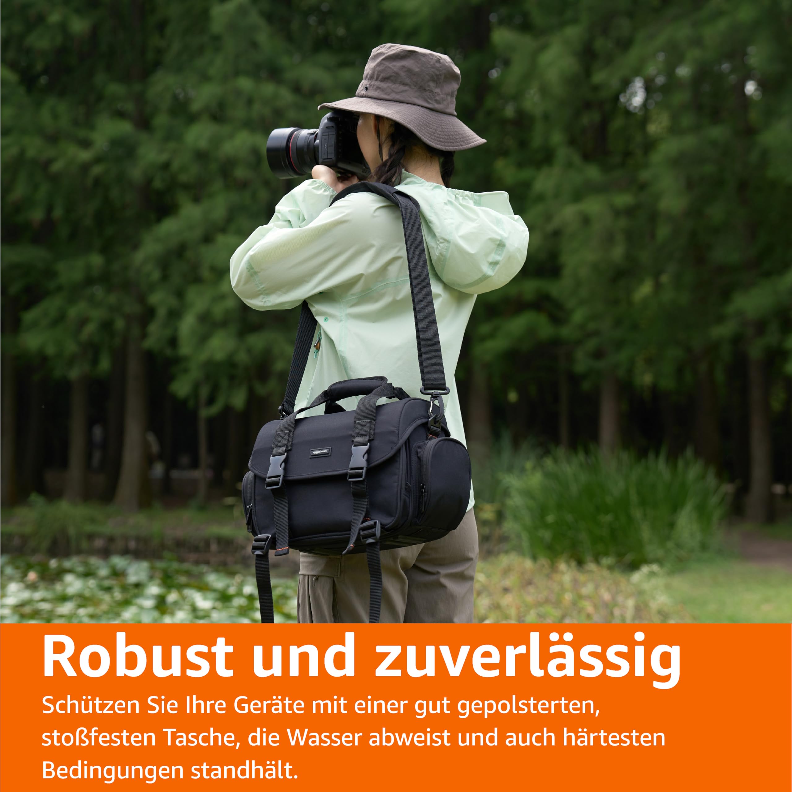 Amazon Basics Schultertasche für SLR-Kamera, Groß, Schwarz/Orange | Wasserdicht