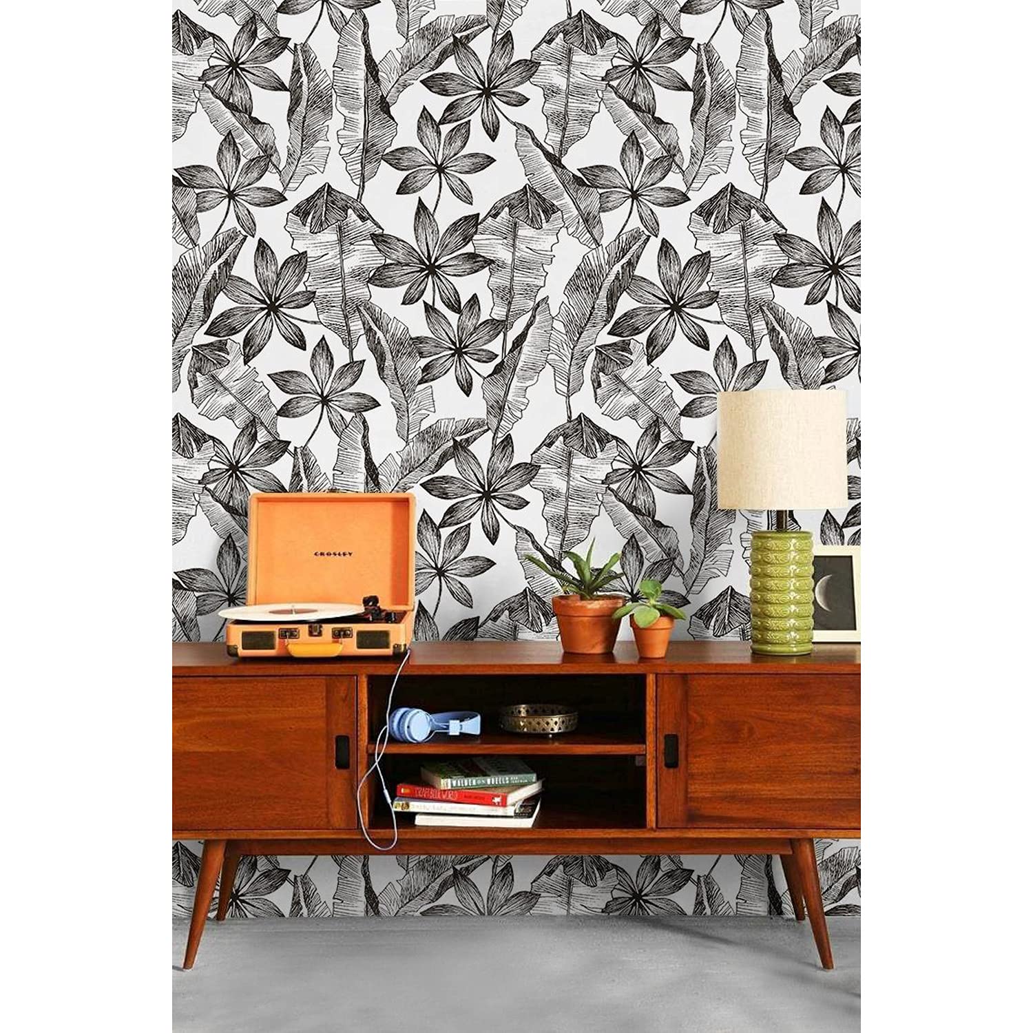 Papier peint mural pour salon et chambre représentant de grandes feuilles tropicales esquissées