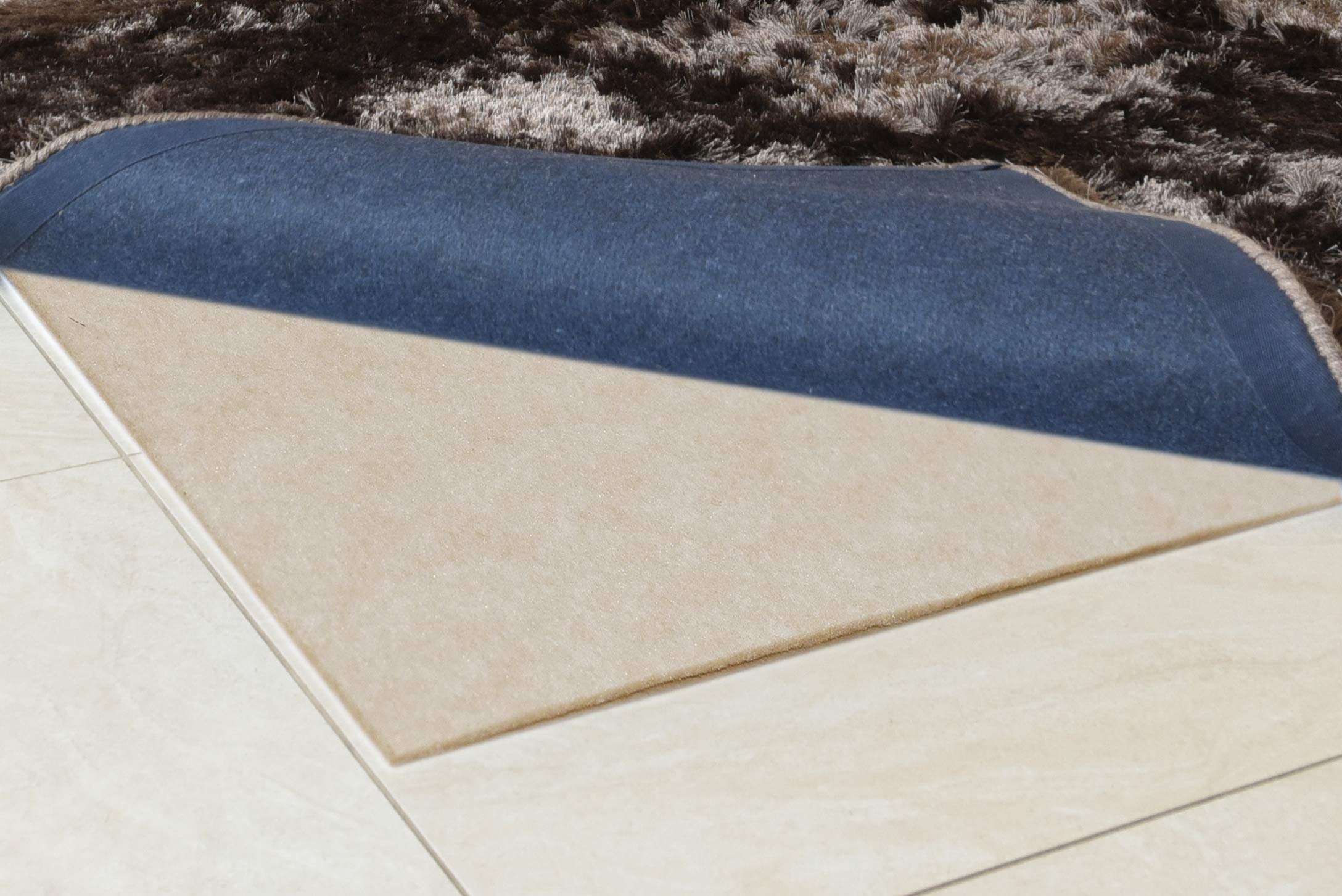 Cybergold Rug Control Heavyweight Underlay Stops rugs and mats moving on all hard floors and all fitted carpets. Thicker than the standard underlay. Best for thin Persian style rugs.(1m x 2m)