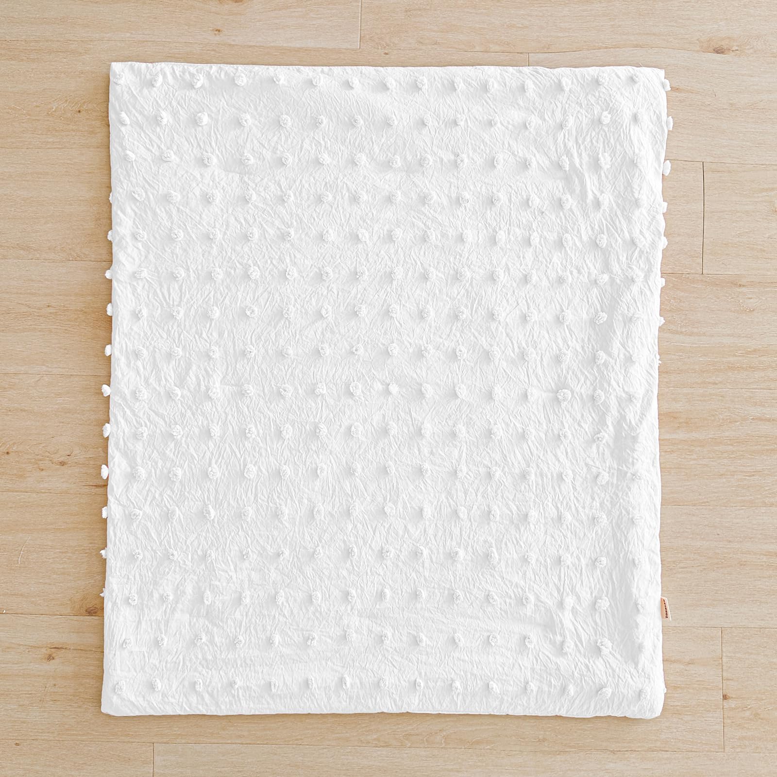 Juego de ropa de cama para cuna de color blanco, edredón de jacquard con lunares copetudos con sábana bajera y falda de cama, lindo bordado bohemio, shabby chic, manta suave con pompones, juego de