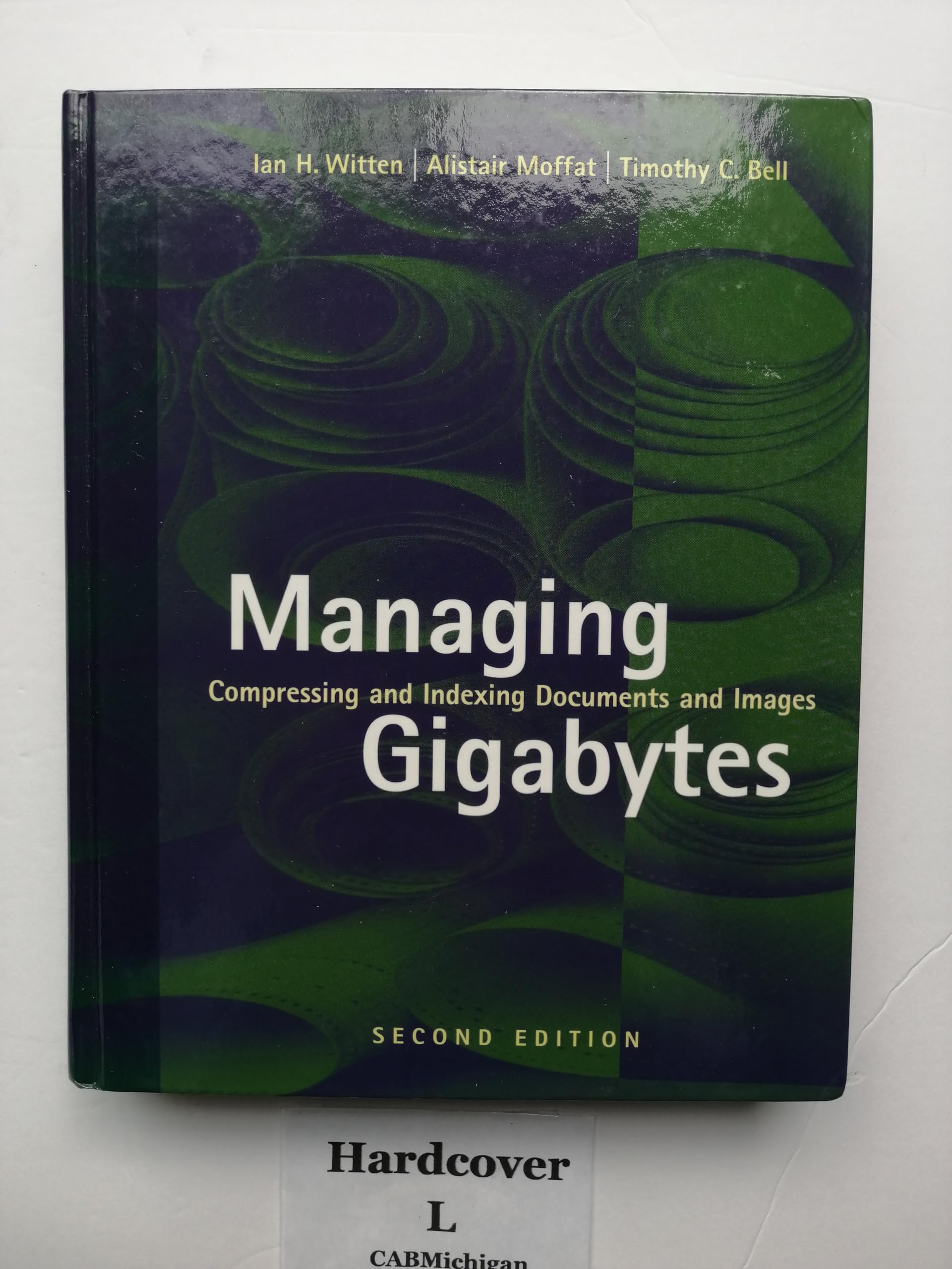 Managing Gigabytes: Compressing and Indexing Documents and Images, Second Edition (The Morgan Kaufmann Series in Multimedia Information and Systems) cover