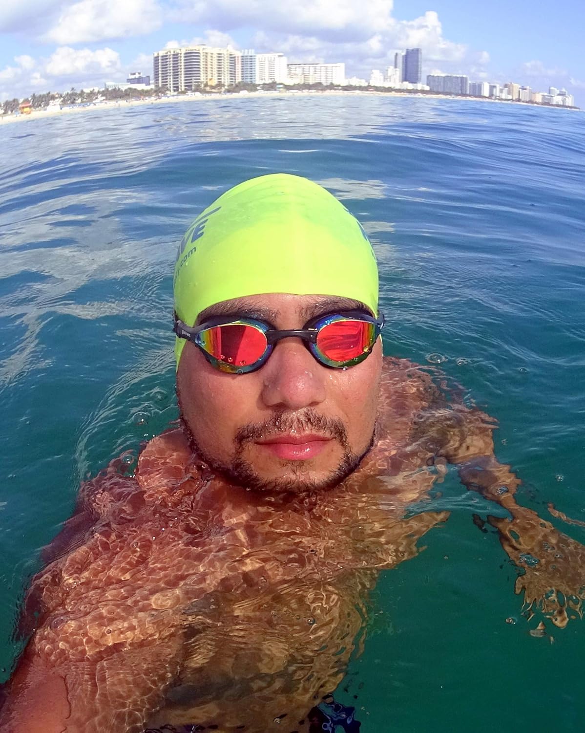 New Wave Swim Goggles with Protective Storage Case - Anti Fog Lenses, Four Nose Bridges for Triathlon & Open Water Swimming (Bonfire = Revo Lens Black Frame)