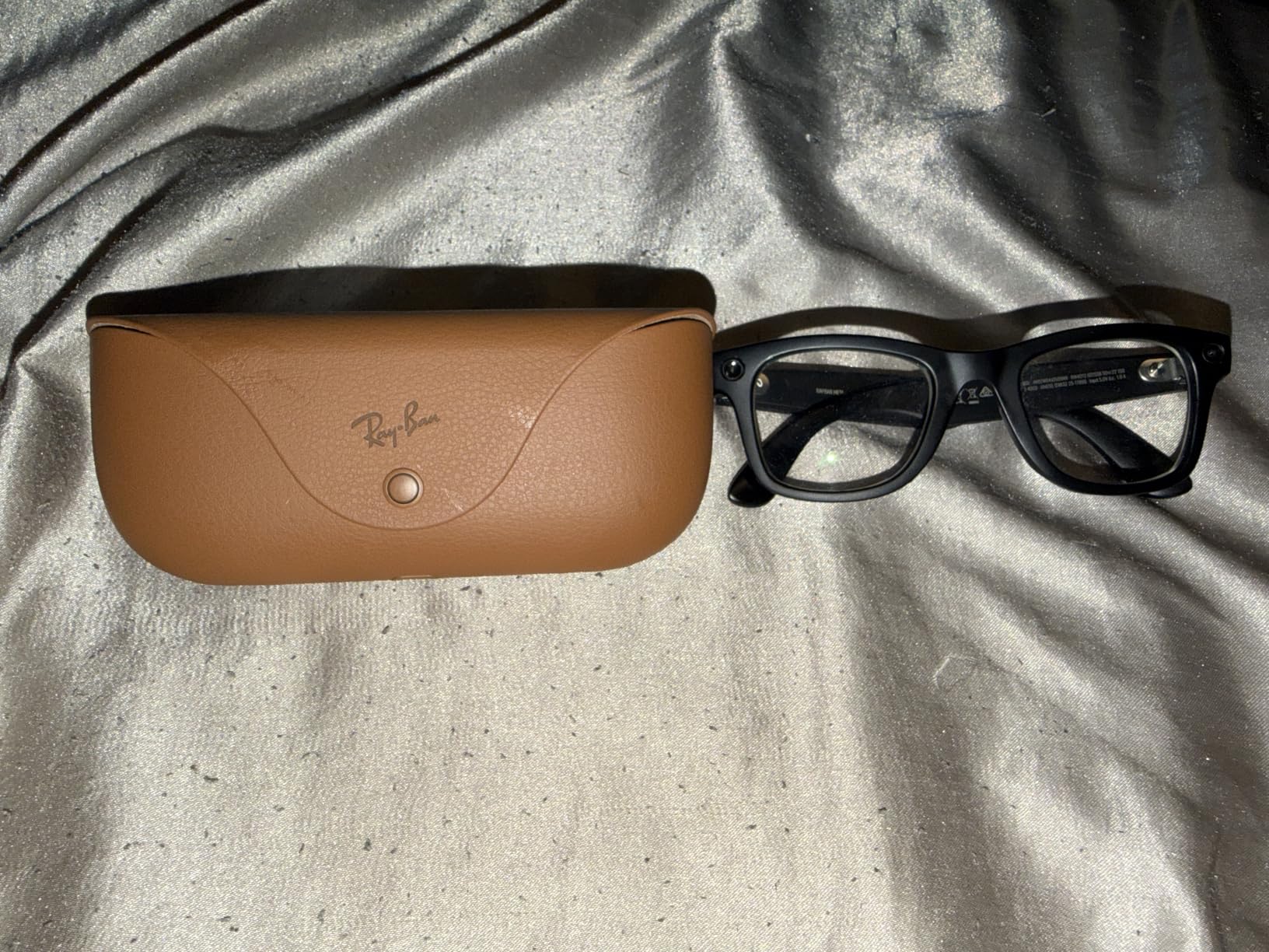Meta Ray-Ban Gen 2 Wayfarer glasses next to charging case