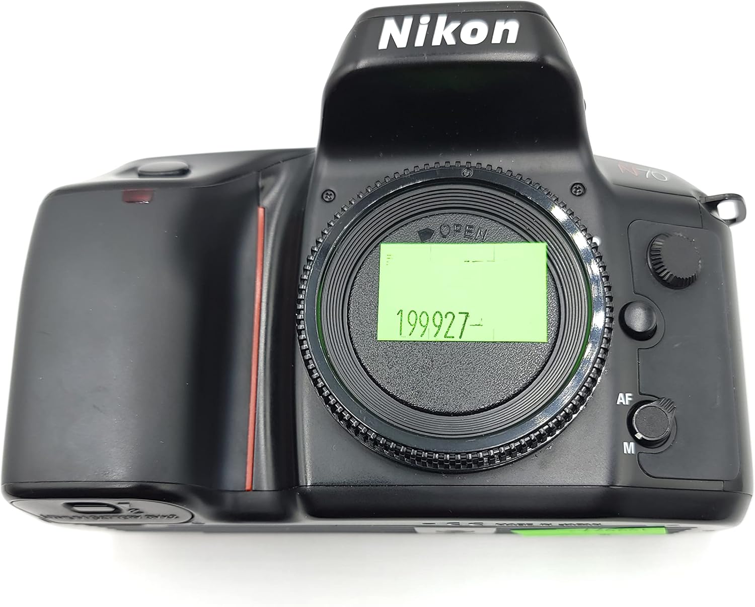 Nikon N70 SLR Camera front view with lens mount and green sticker