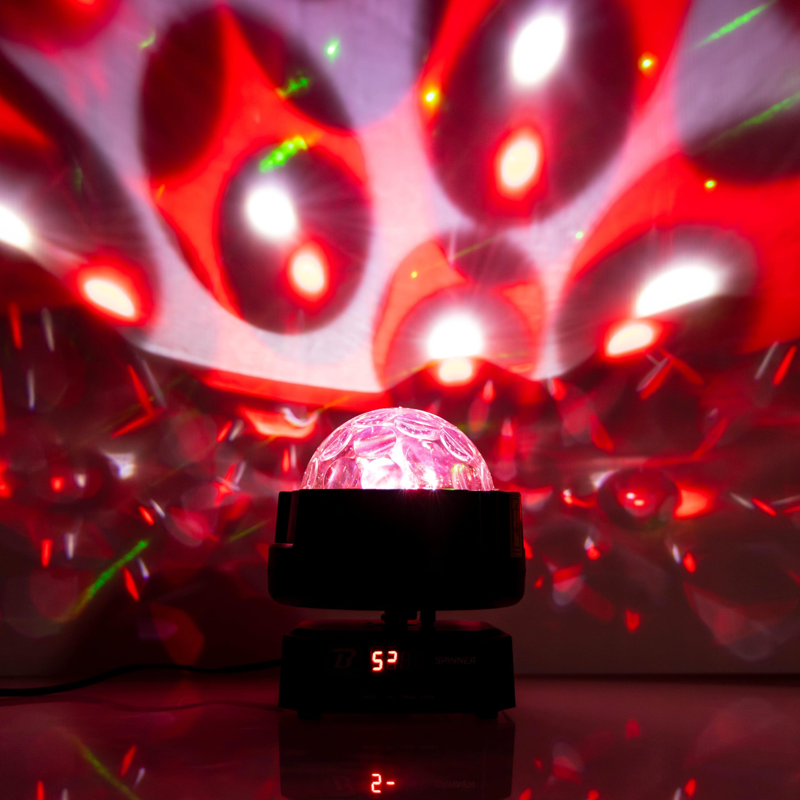 BoomToneDJ Spinner 3-in-1-LED-Lichtspiel, Multi-Strahleffekt, Stroboskop, Lichtstrahlen grün/rot, DMX-Steuerung, IR-Fernbedienung enthalten