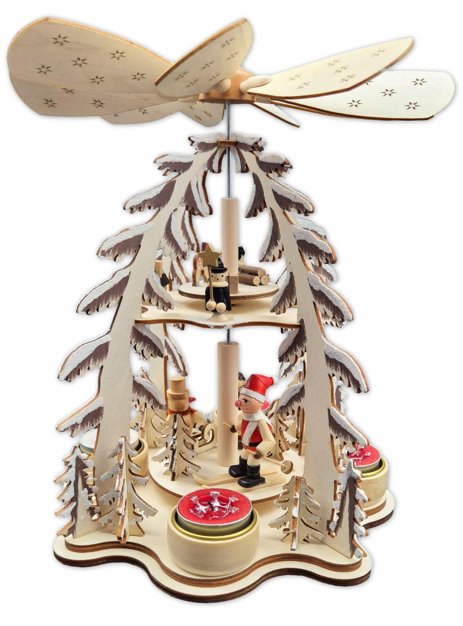 Wichtelstube-Kollektion XL Weihnachtspyramide Skifahrer und Sternensinger, Pyramide für Teelichter Weihnachten Weihnachtsdeko Holz mehrere Ebenen 30cm groß
