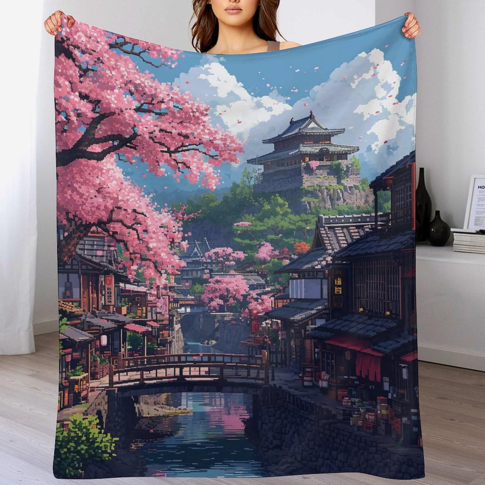 Couverture polaire flannel cerisier japonais pour des soirées cocooning sur le canapé