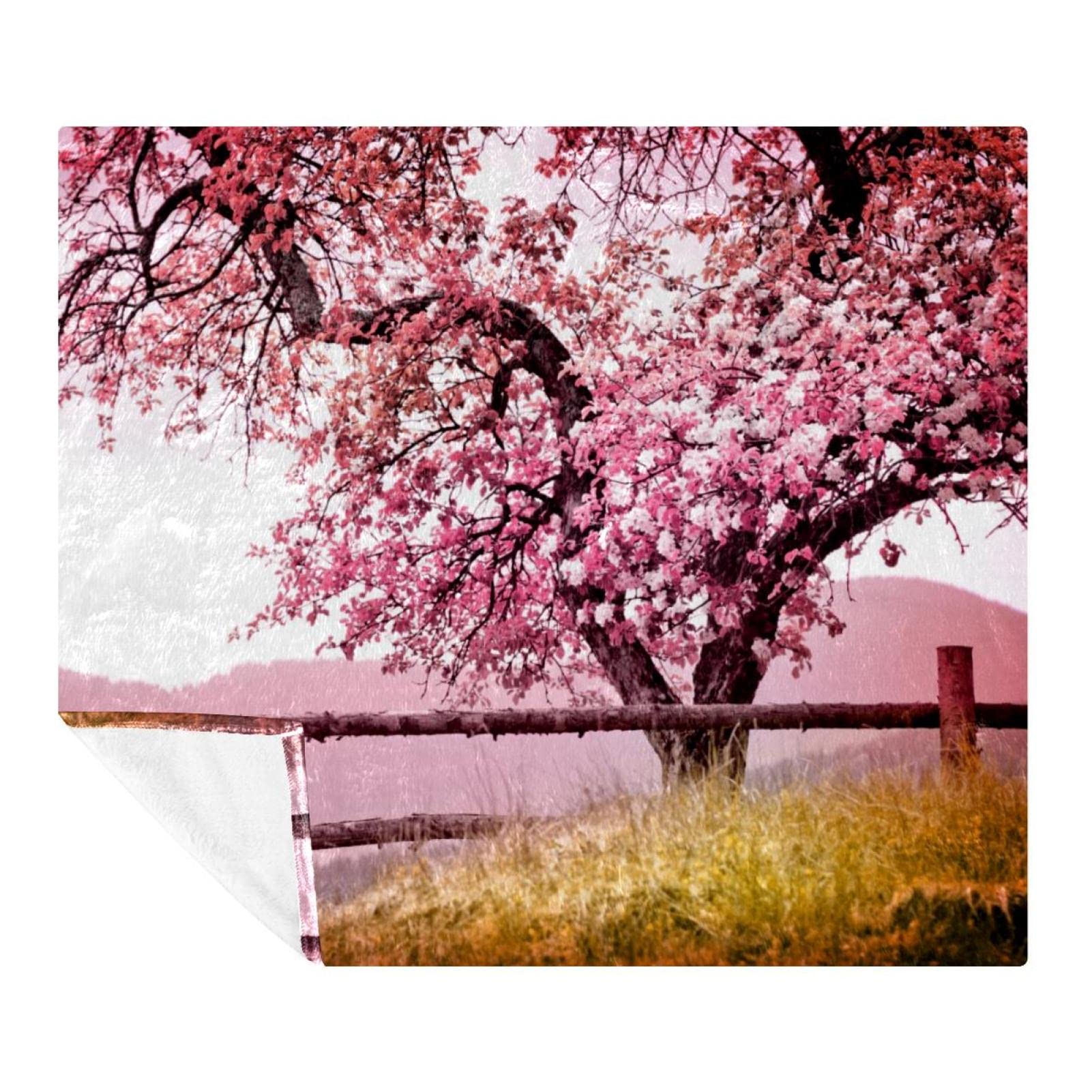 Couverture douce Blossom Tree pour des moments cocooning sur le canapé et en voyage