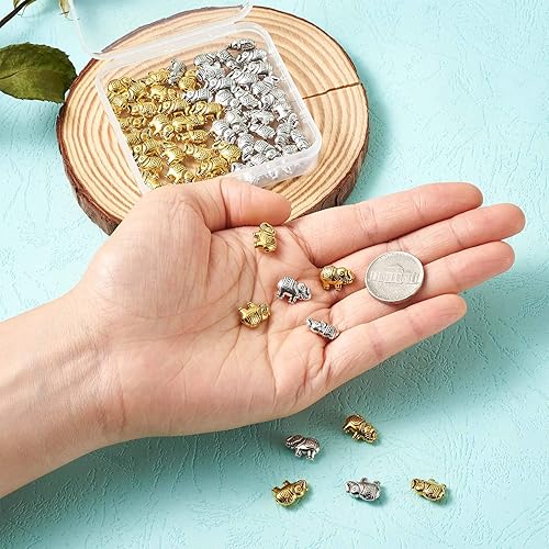Miniatura 6 de Craftdady 60 cuentas espaciadoras de metal tibetano de elefante de la suerte, cuentas de animales talladas con detalles de oro antiguo y plata de