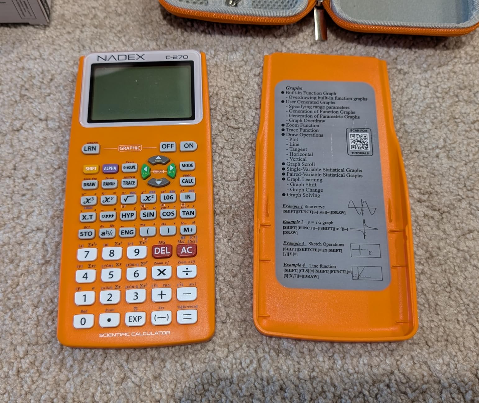 Scientific calculator laid open on a student's notebook beside math textbooks