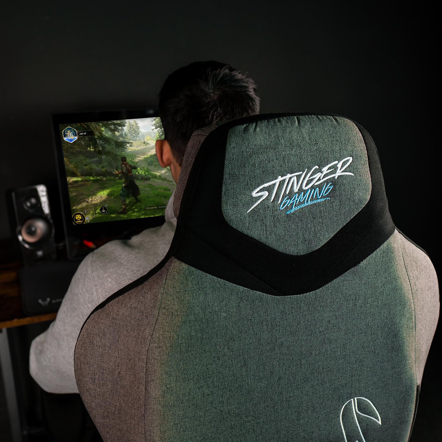 Woxter Stinger Station Titan Dark - Sedia da gaming ergonomica, tessuto idrorepellente, asse di resistenza realizzato in acciaio e ruote silenziose di massima qualità, GM26-110
