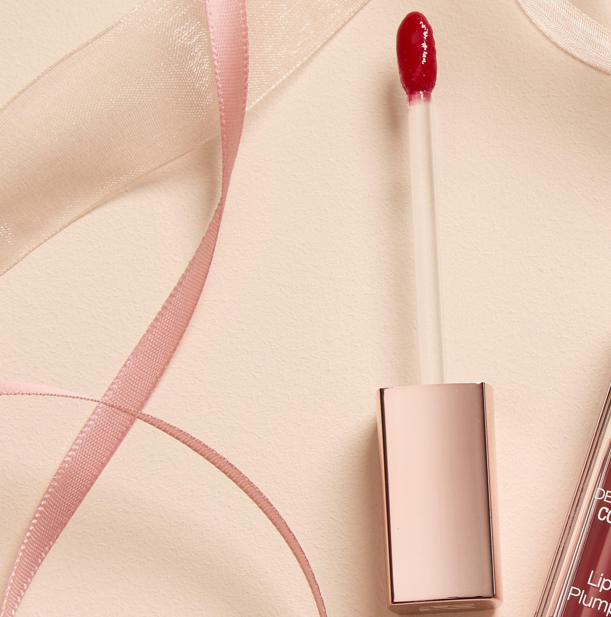 BioNike Defence Color Lip Plump - Połysk o działaniu nawilżającym i upalającym*. Kremowa i wygodna tekstura, Miękkie i nawilżone usta - N.001 Nude Rose