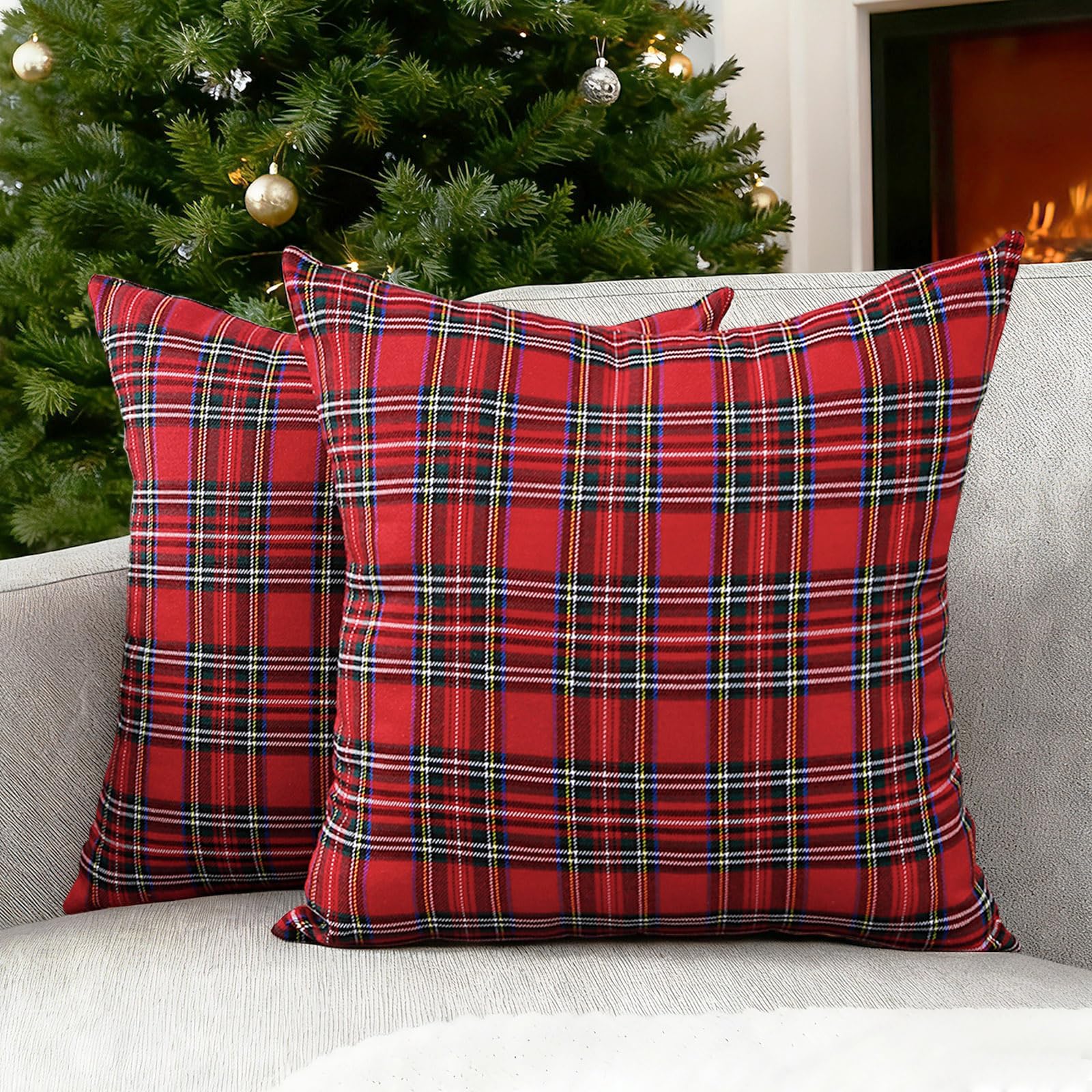 Festive Christmas pillows on a cozy holiday sofa.