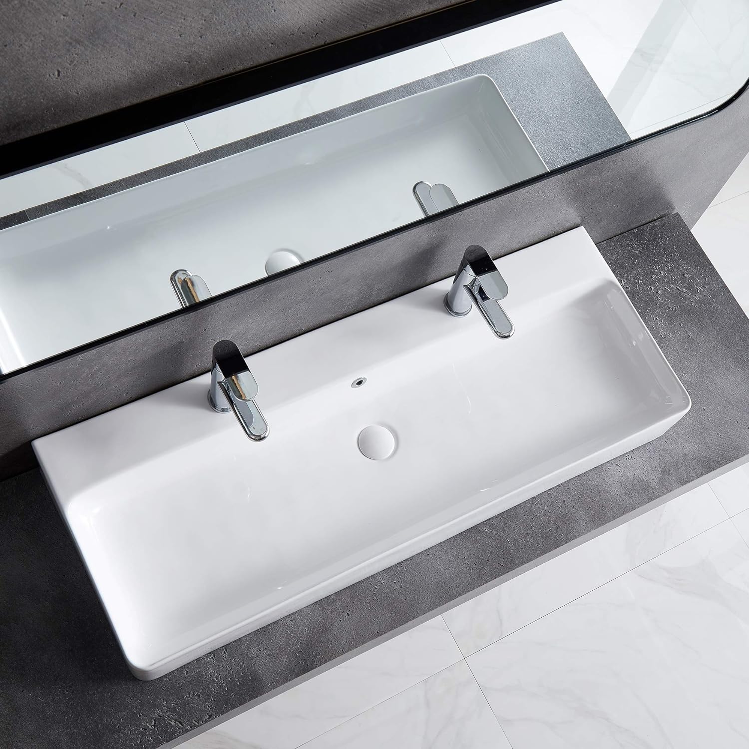 Another view of the Eridanus sink installed as a wall-mounted unit, showcasing its sleek profile.