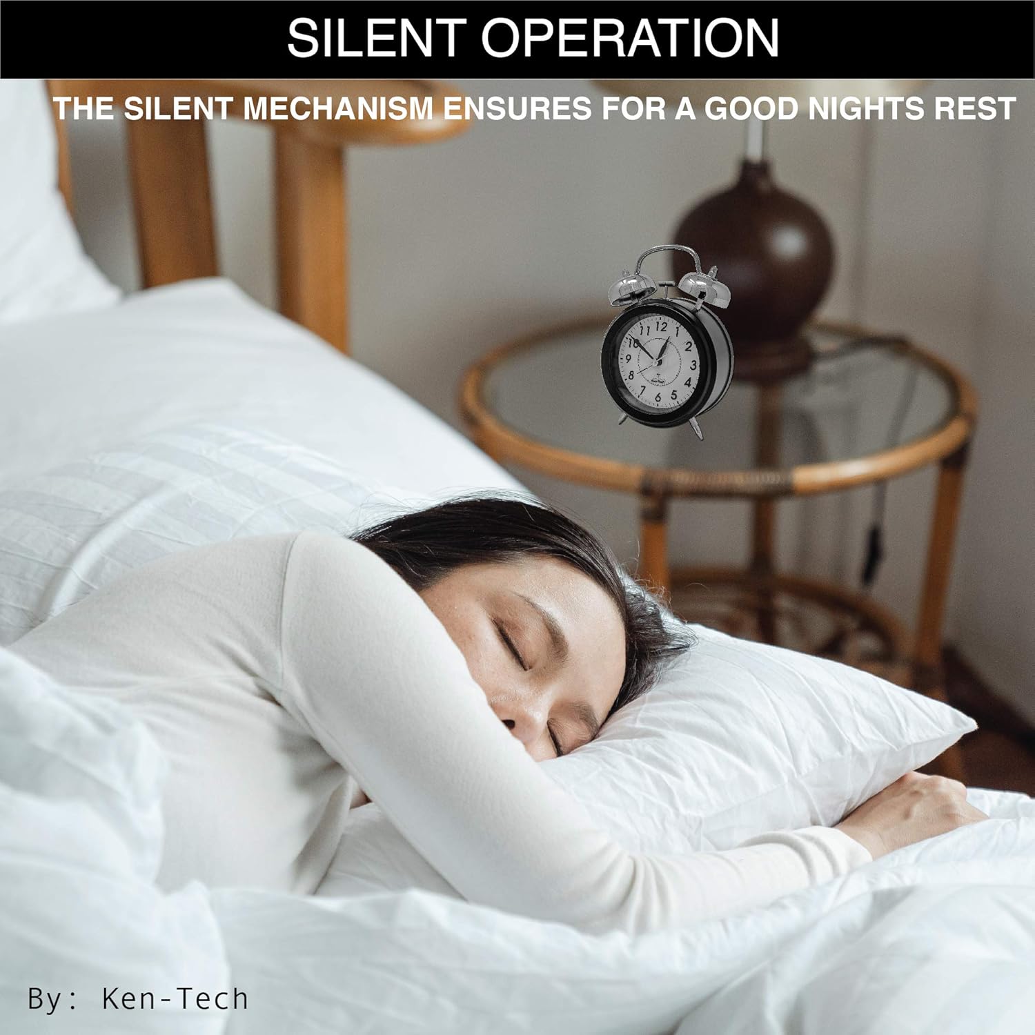 A person sleeping soundly in bed, with the Sonnet Twin Bell Alarm Clock on a nearby table, emphasizing its silent operation.