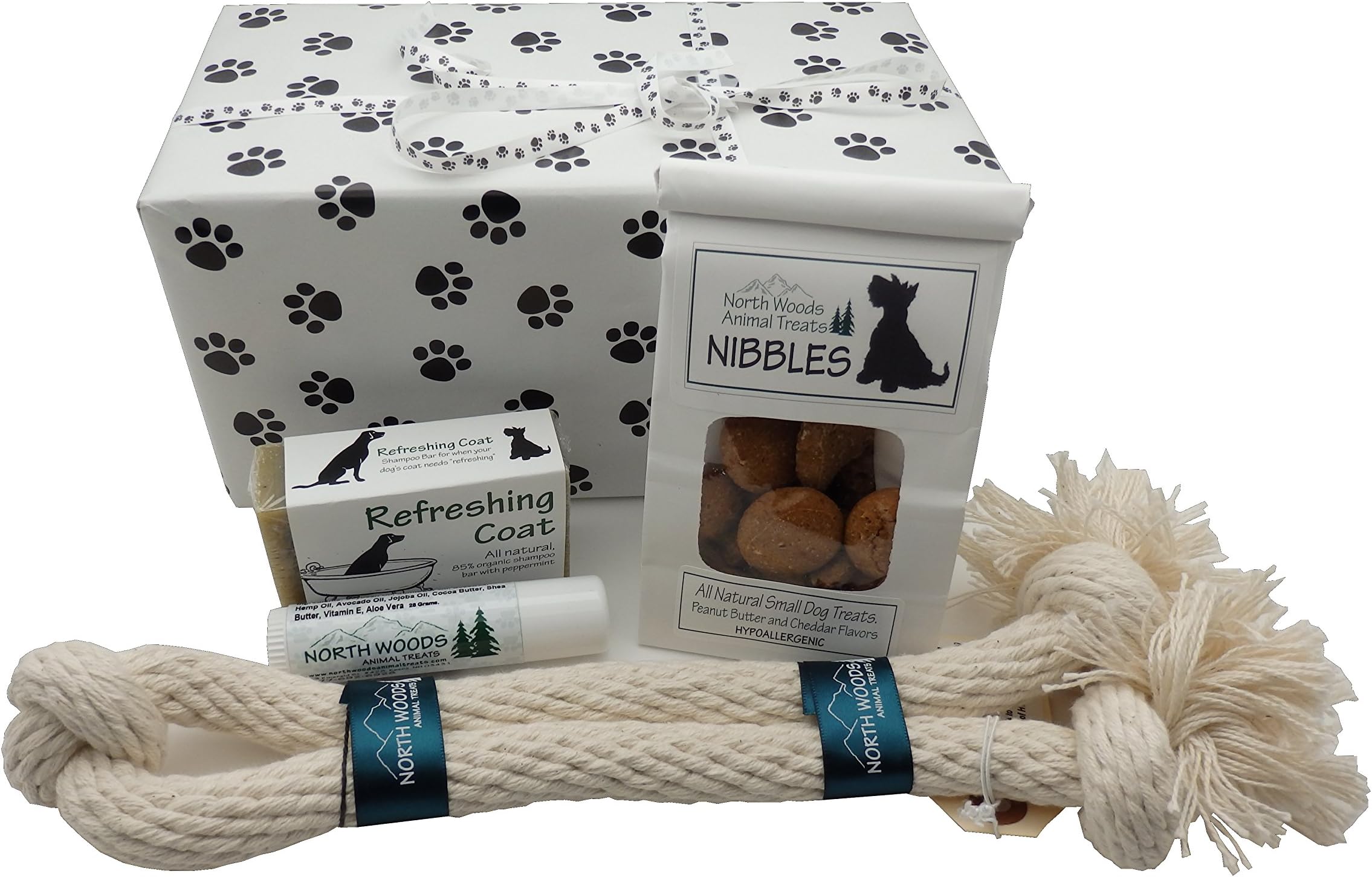SanAndCo Pampered Puppy Deluxe Welcome Box - Made in NH Small Treats Tug Toy Soothing Paws Balm and Refreshing Shampoo - in Paw Print Wrapped Box