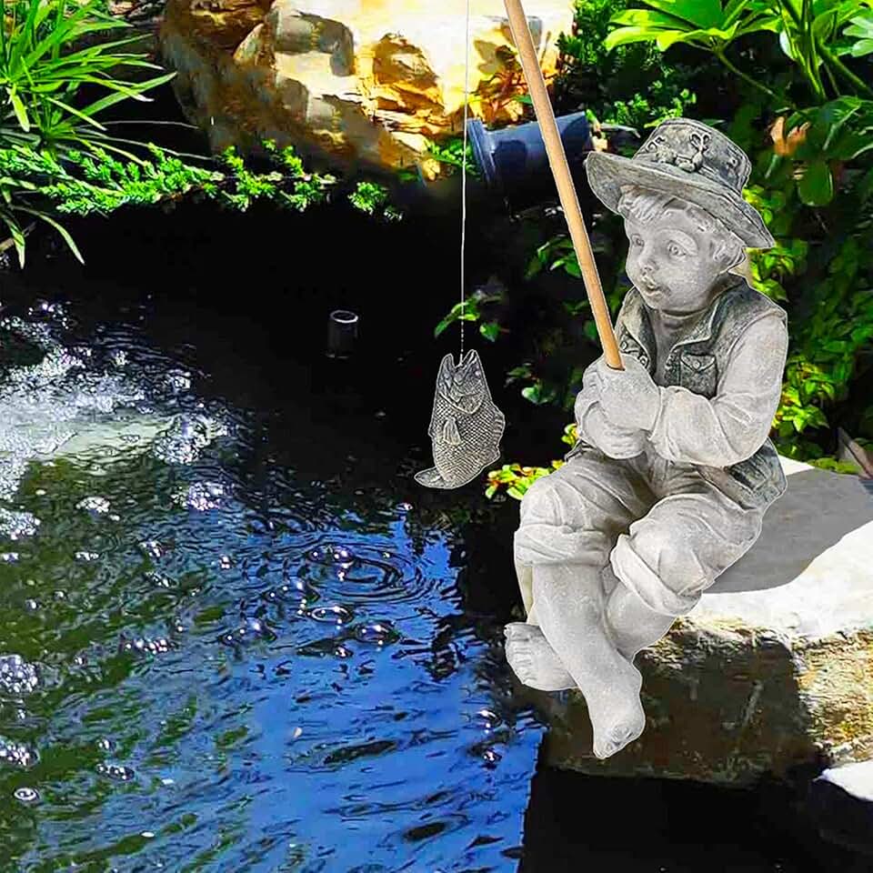 little boy garden statue