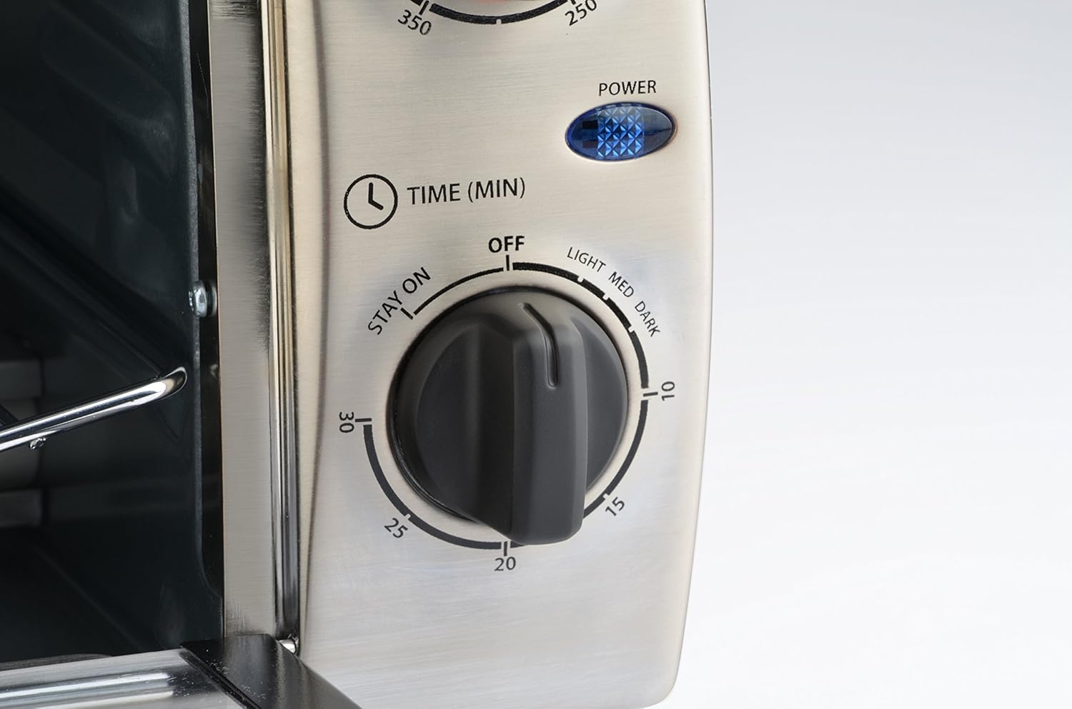 Close-up of the timer control dial on the Toastmaster TM-103TR Toaster Oven