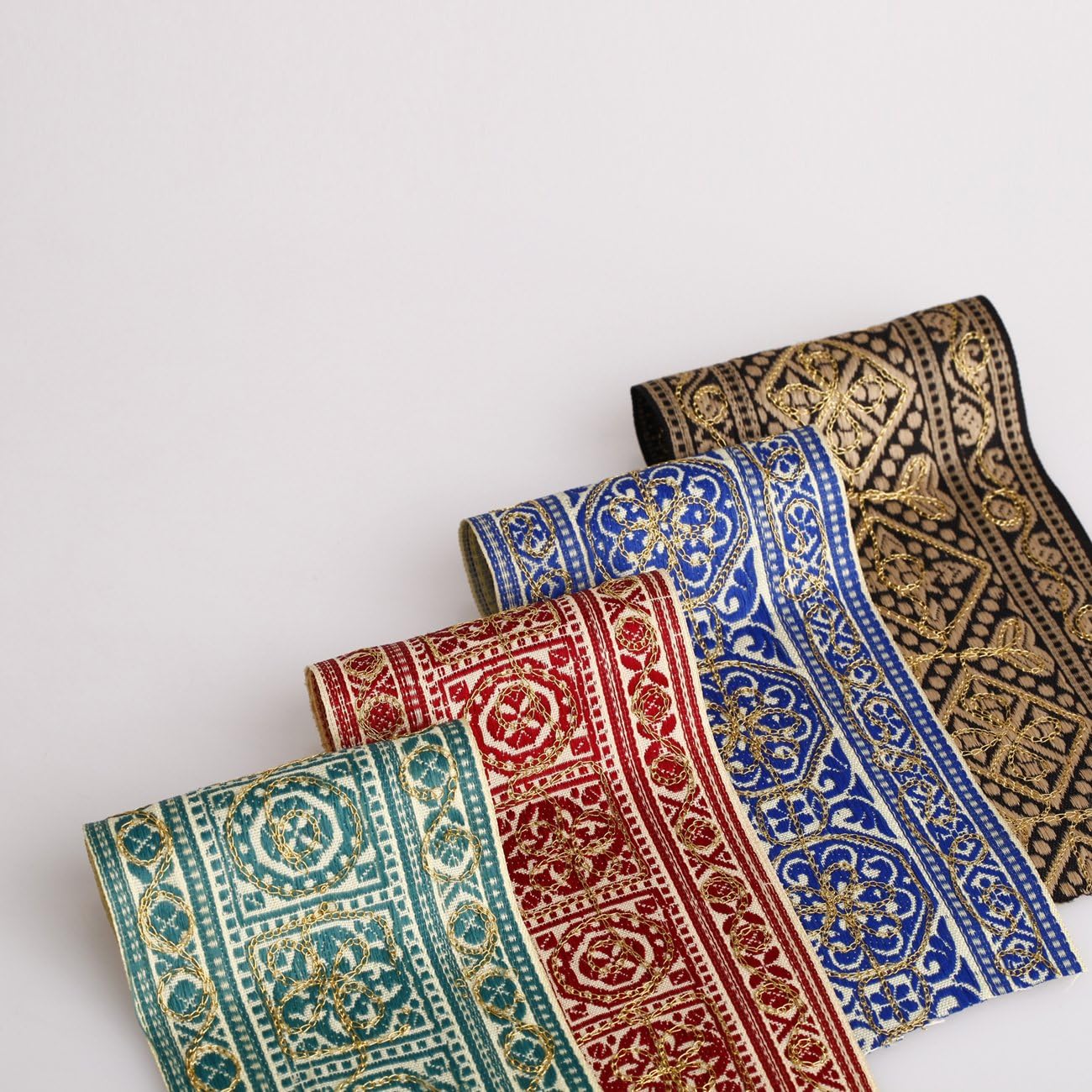 Neotrim Indian Salwar Kameez Embroidery, Aztec Celtic Ribbon Trimming By the Yard. Simply Stunning and Very Limited Edition Fancy Ribbon Trimming. 7-7.5 cm Wide. Sold as 1 meter or 3 meters discounted price. 3 Great colours Available; 1) Soft Sage Green, 2) Indian Royal Blue, 3) Red, 4) Black! Amazing with Cotton feel.