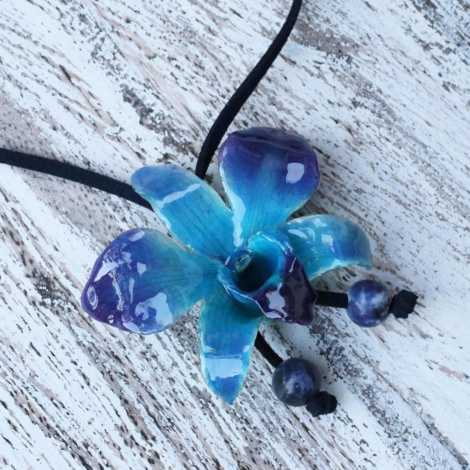 NOVICA Artisan Handmade Natural Orchid Sodalite Long Necklace Flower Lariat Leaf Leather Blue Thailand Floral 'Midnight Blue'