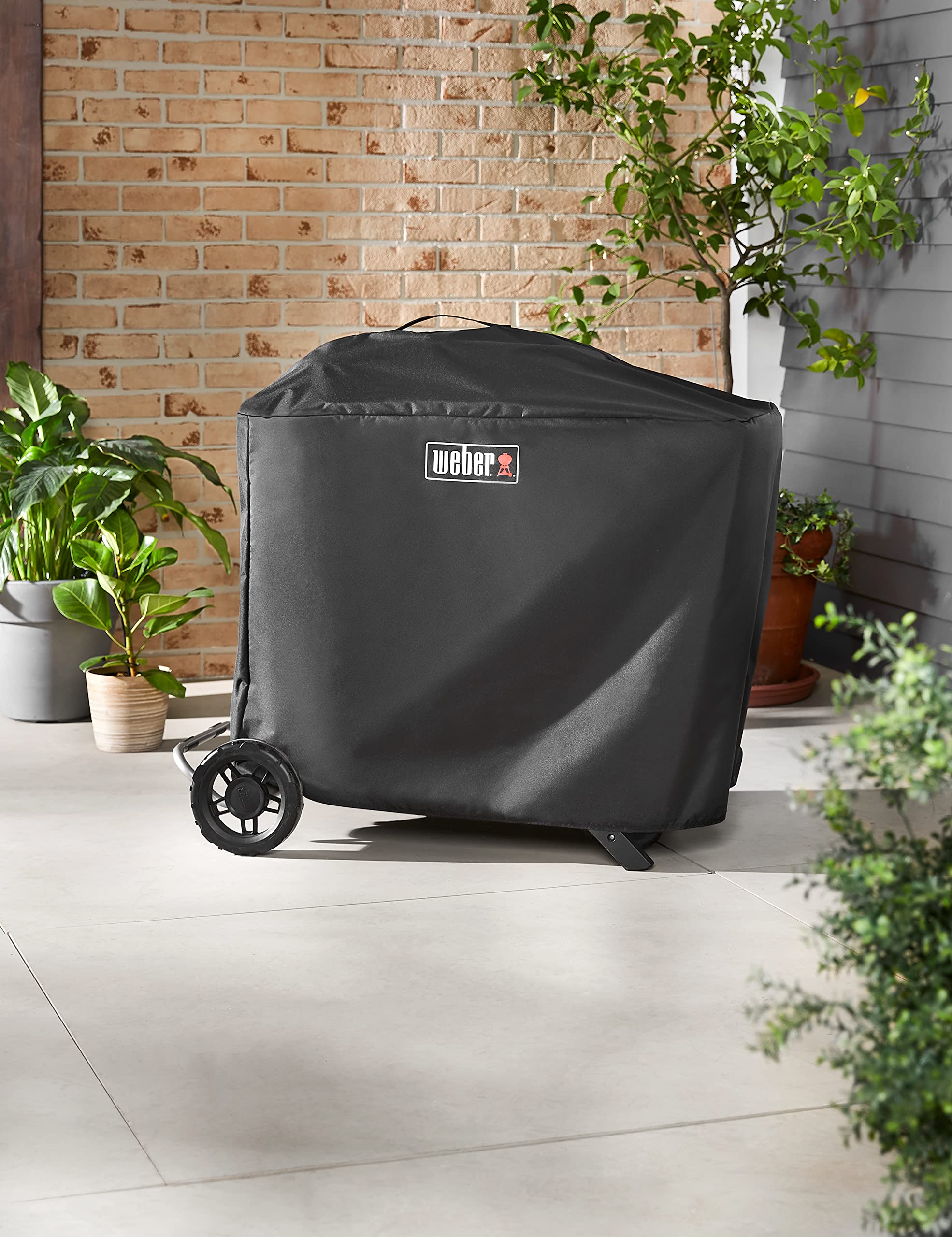 Weber Premium Grill Abedeckhaube für den Traveler Gas Grill, atmungsaktiv UV- & wasserbeständig, Schutz for Wind & Wetter, mit Klettverschluss zum Befestigen - Schwarz (7770)