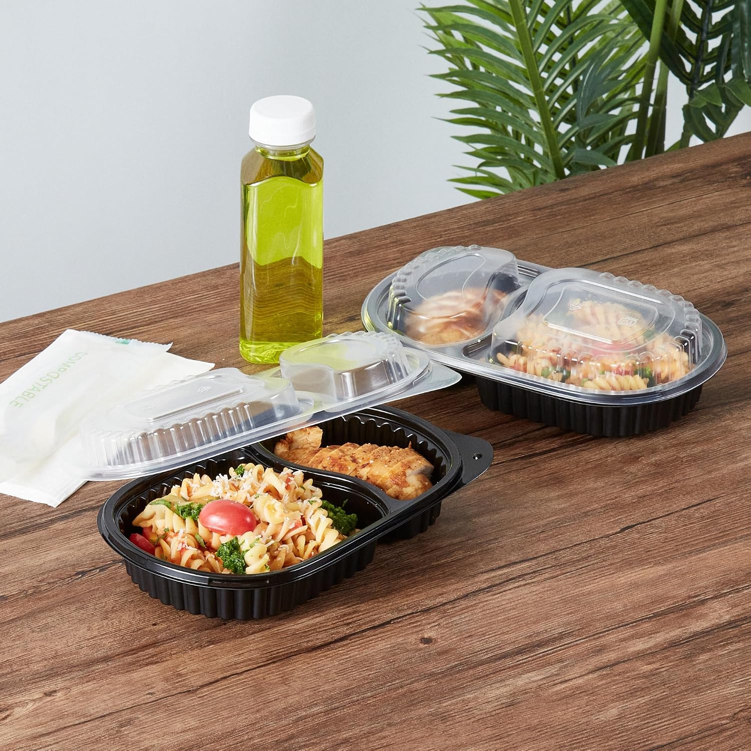 Restaurantware-Chef 101 20 Ounce Meal Prep Containers, 50 Microwavable To Go Containers With Lids - Disposable, Freezable, Black Plastic Oval Food Containers, Pack Hot And Cold Food, For Takeaway