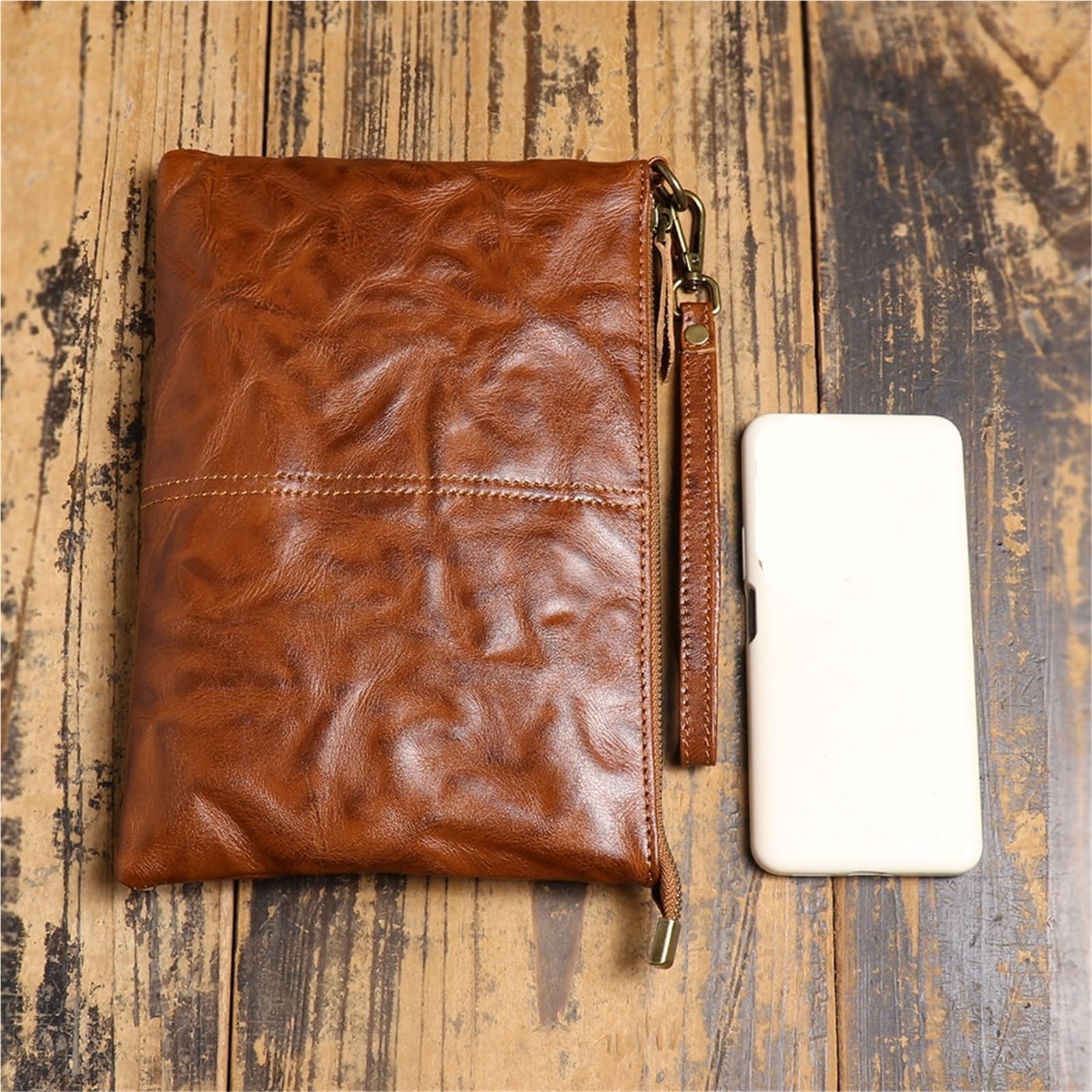 Portafoglio pochette in pelle vintage, cerniera sicura, elegante braccialetto da uomo