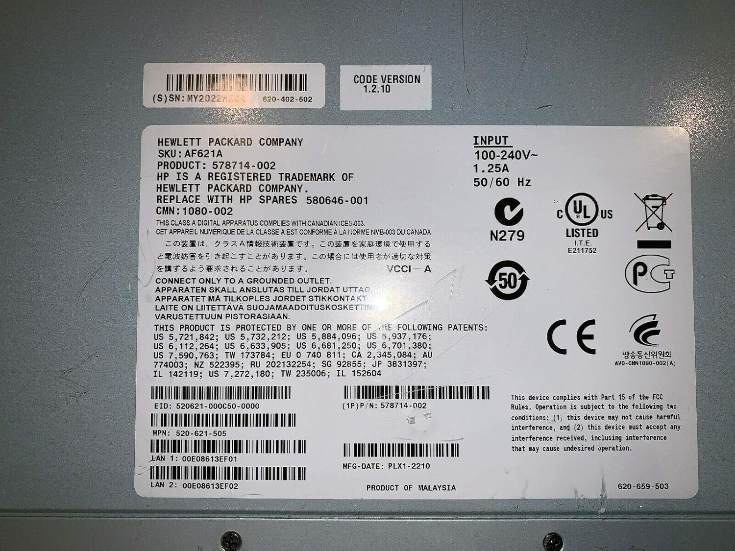 Product label of the HP AF621A KVM Switch, showing model number, input power specifications, regulatory marks, and serial/part numbers.