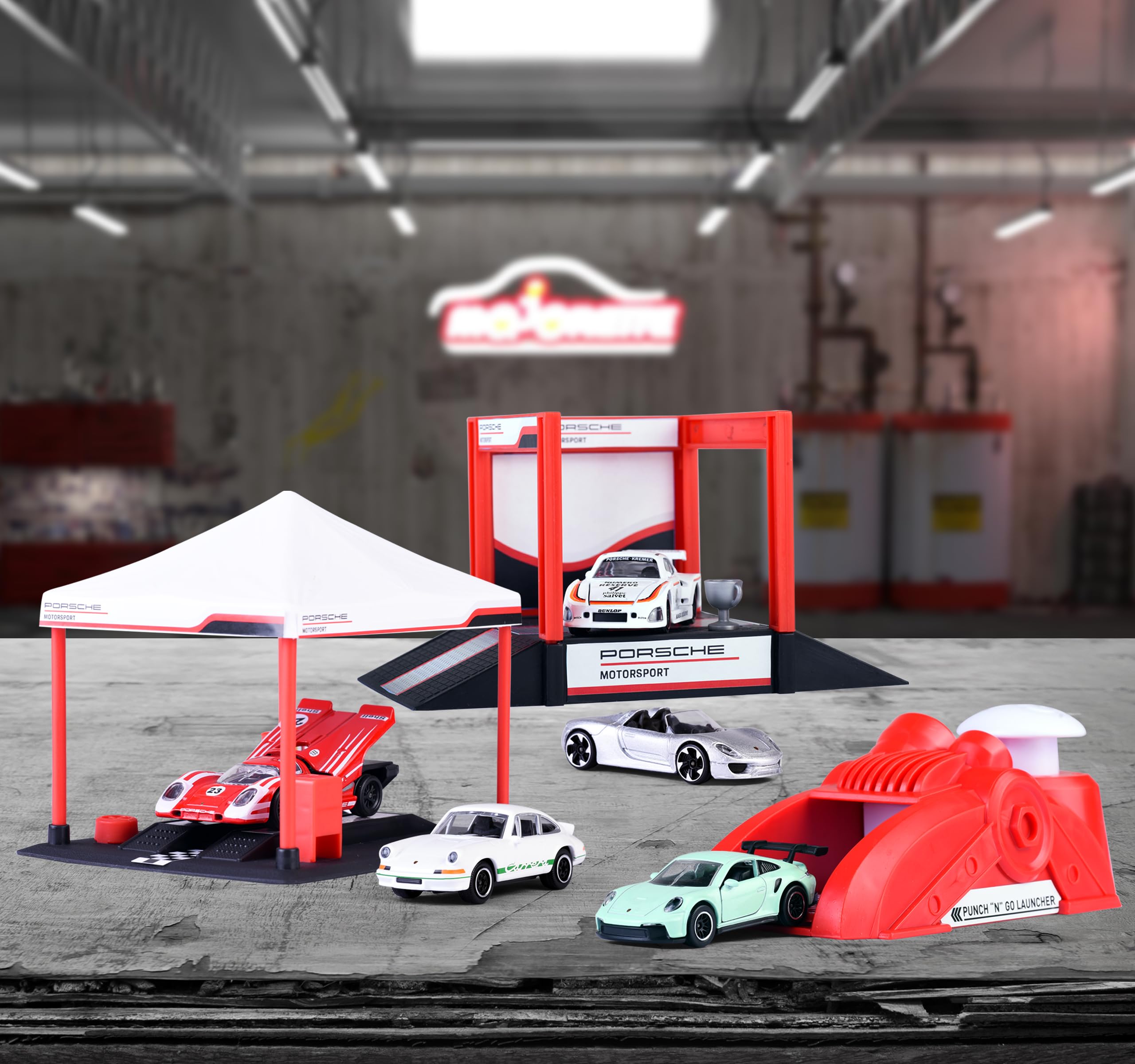 Majorette - Stoisko do biegania i podium Porsche - 5 pojazdów w zestawie - Puncher and Trophy - Od 3 lat - 212053305
