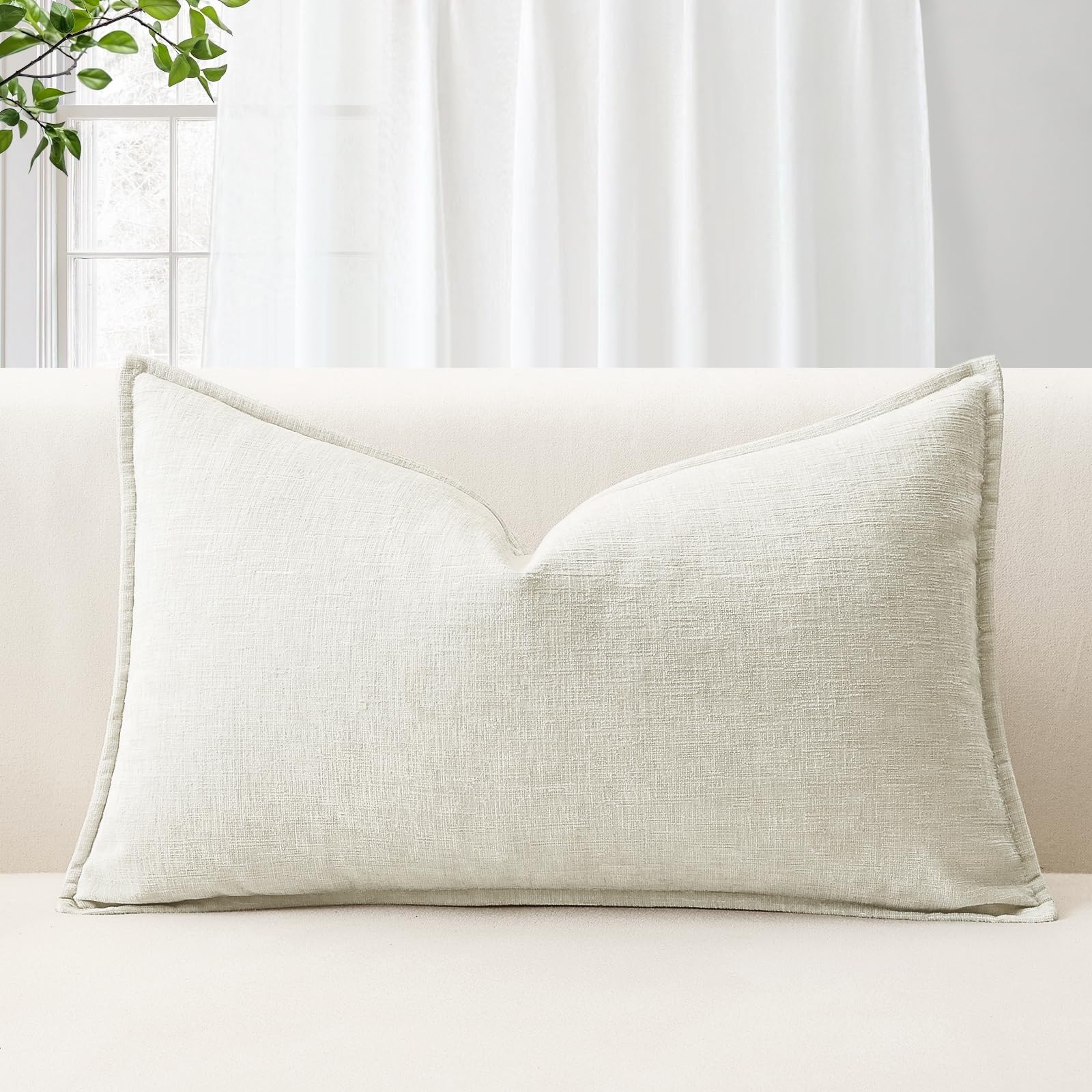 Housse de coussin en chenille premium aux finitions haute couture
