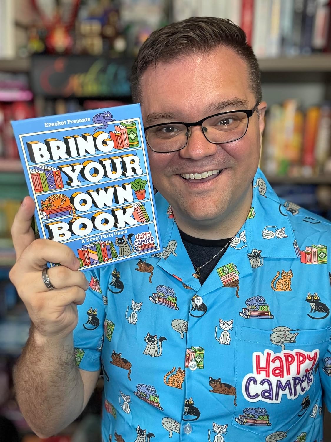 Happy Camper - Bring Your Own Book - A Novel Party Game | Ezeekat BookTok Favorite | Perfect Bookish Gift for Book Clubs and Family Game Night | 3-8 Players * Ages 12+