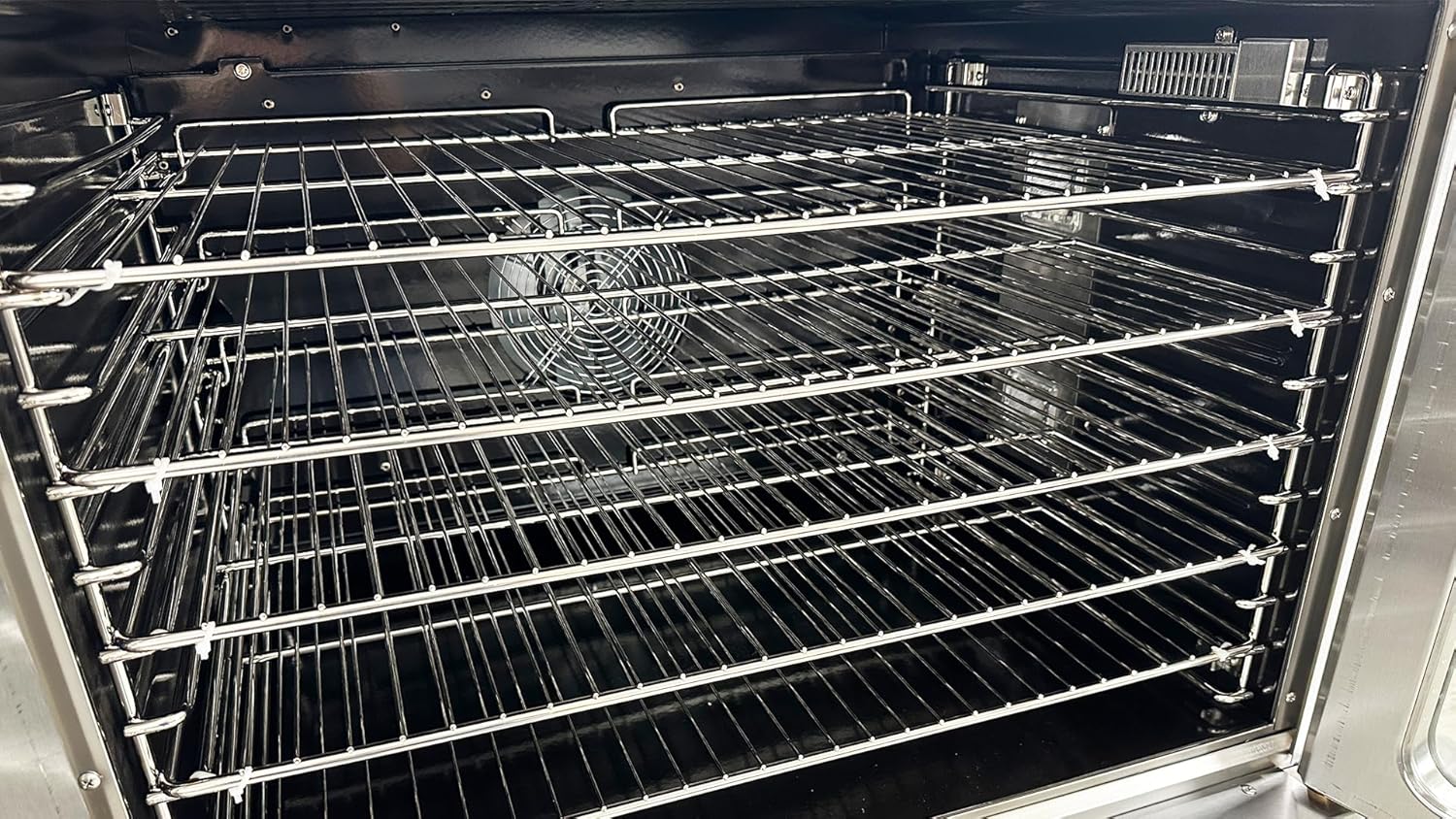 Interior view of the oven with adjustable racks