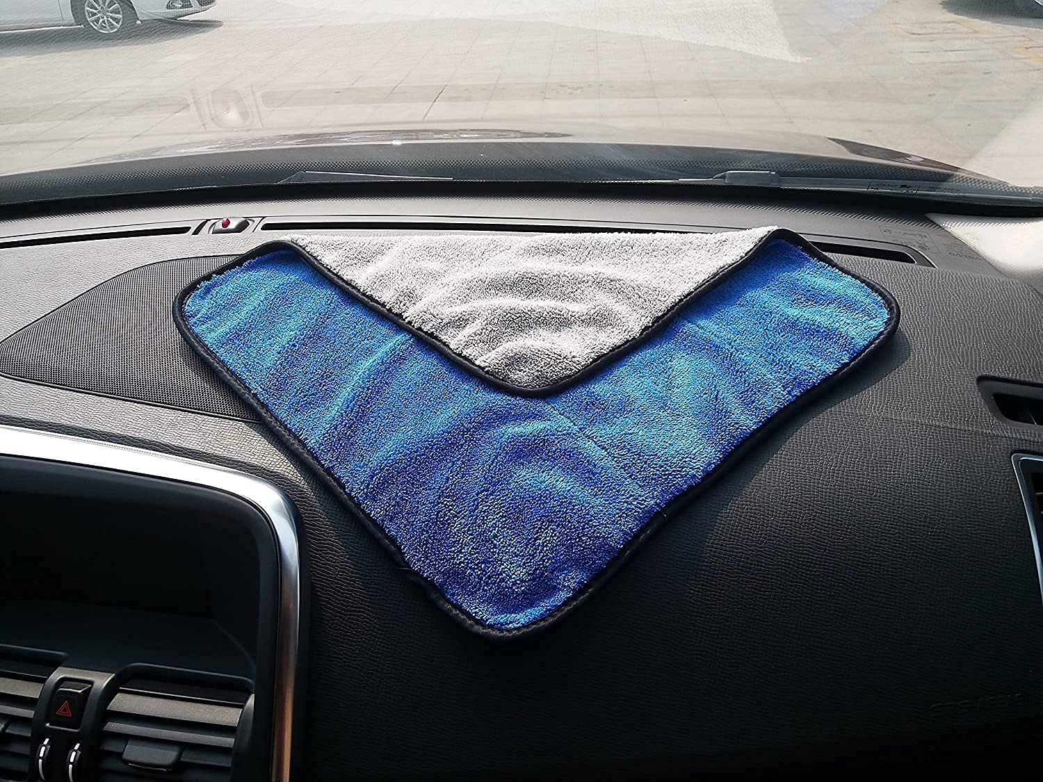 VOONI Micro Fiber Cleaning Cloth placed on a car dashboard.